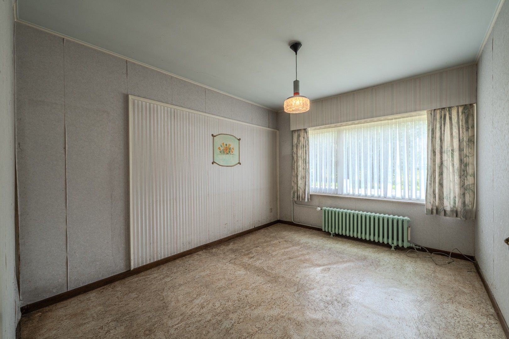 Te renoveren bungalow op ruim perceel foto 12