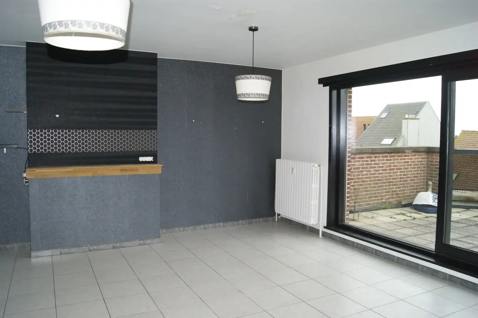 Ruim appartement met 2 slaapkamers en uitzonderlijk groot terras foto {{pictureIndex}}