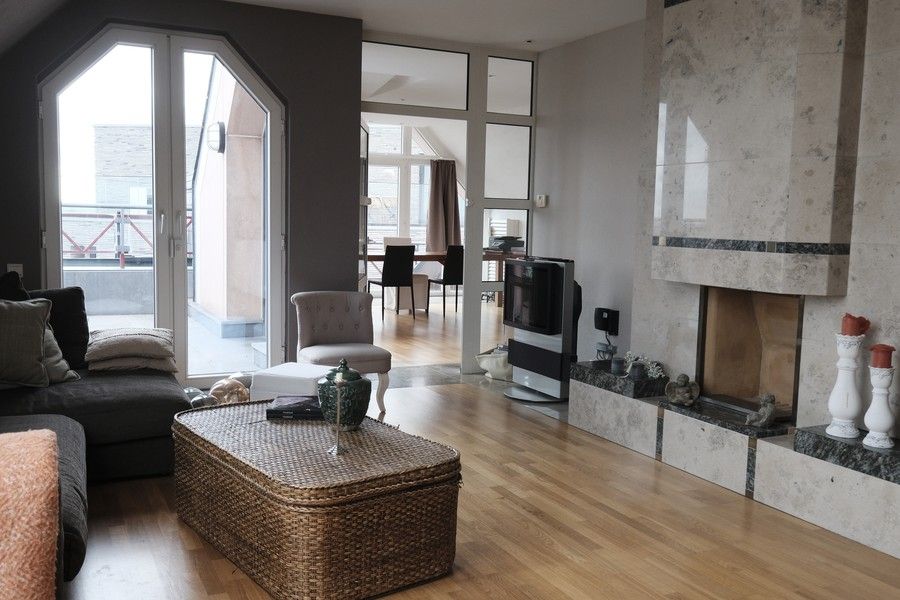 Penthouse midden in het centrum van Hasselt met 2 slaapkamers en een dubbele garage foto {{pictureIndex}}
