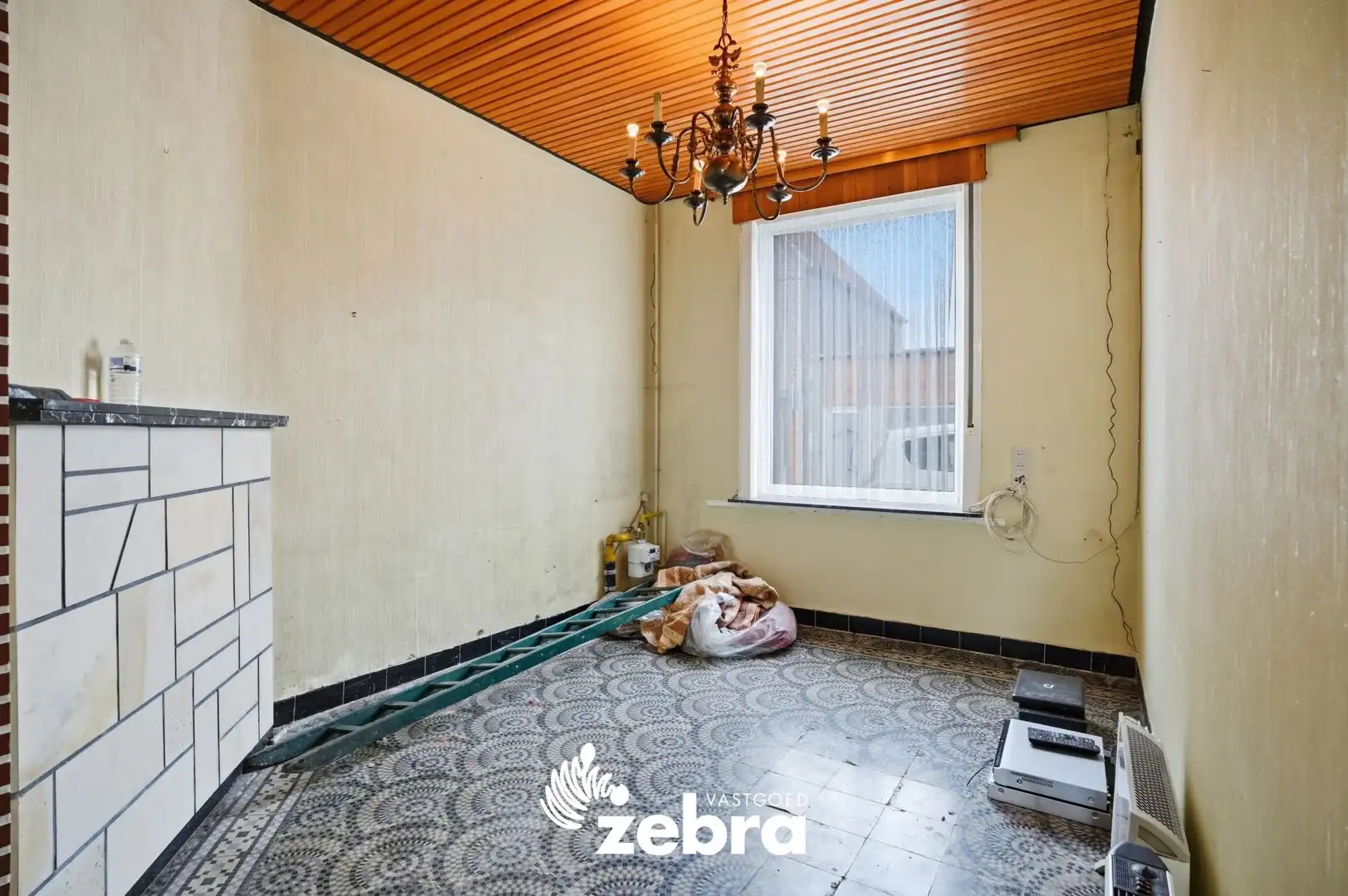 Te renoveren woning met tuin op centrale ligging in Tielt! foto 3