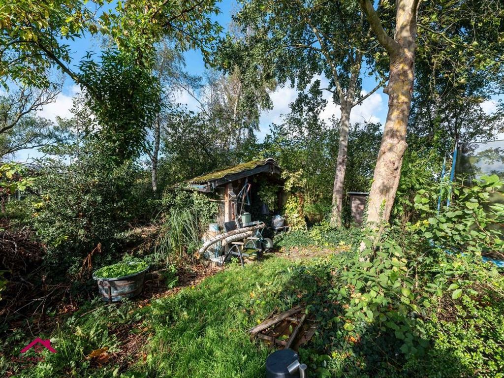 Vrijstaande woning op ruim perceel foto 40