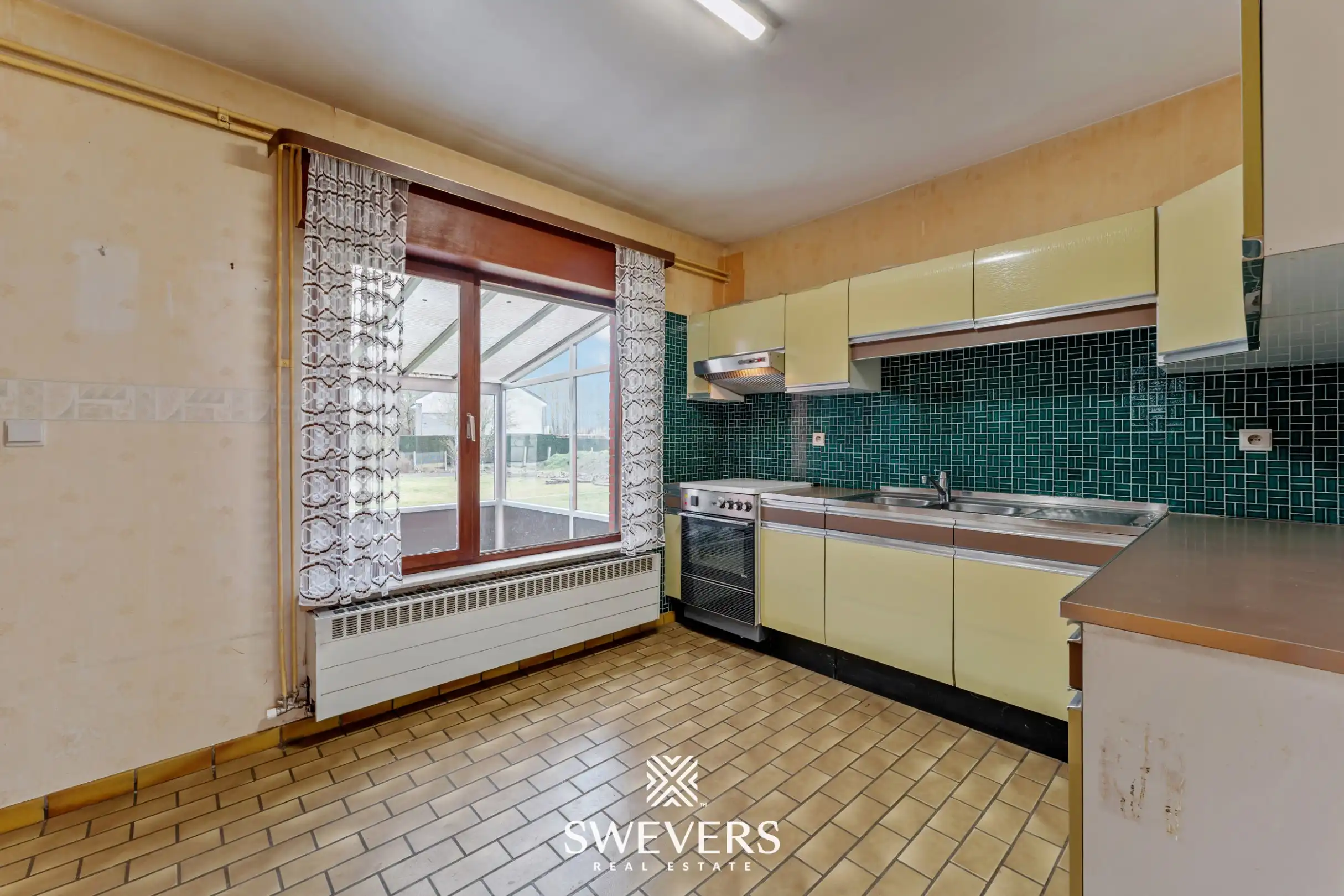 Charmante woning met ruime tuin en renovatiemogelijkheden in Halen foto 10