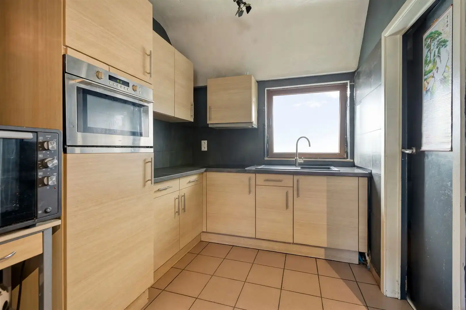 TE KOOP: Uniek woon- en investeringspand met ruime woning en 6 verhuurde studio’s te Heusden-Zolder! foto 56
