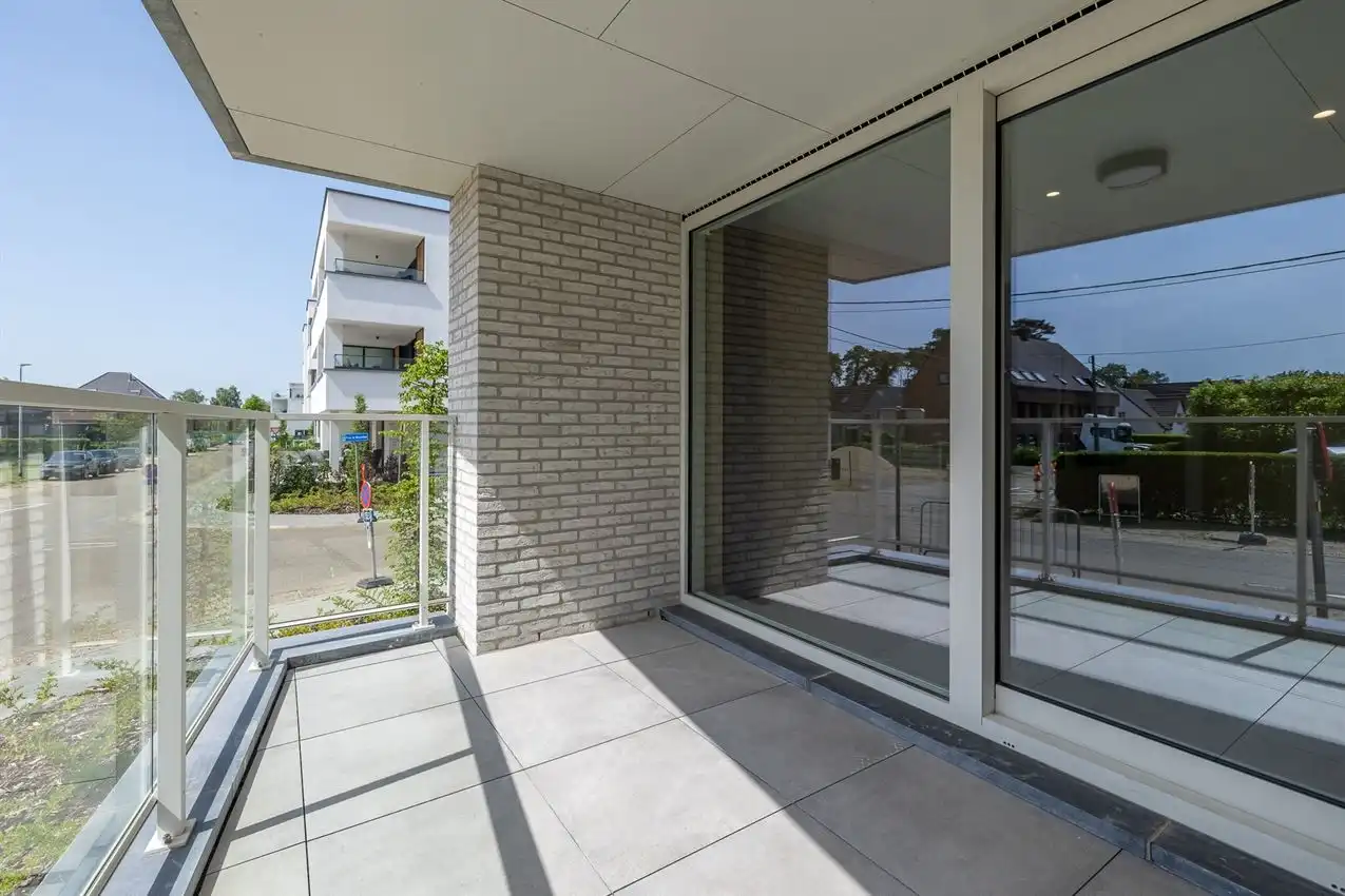 Gelijkvloers app. met twee slaapkamers, zuidterras, garage nabij bossen foto 11