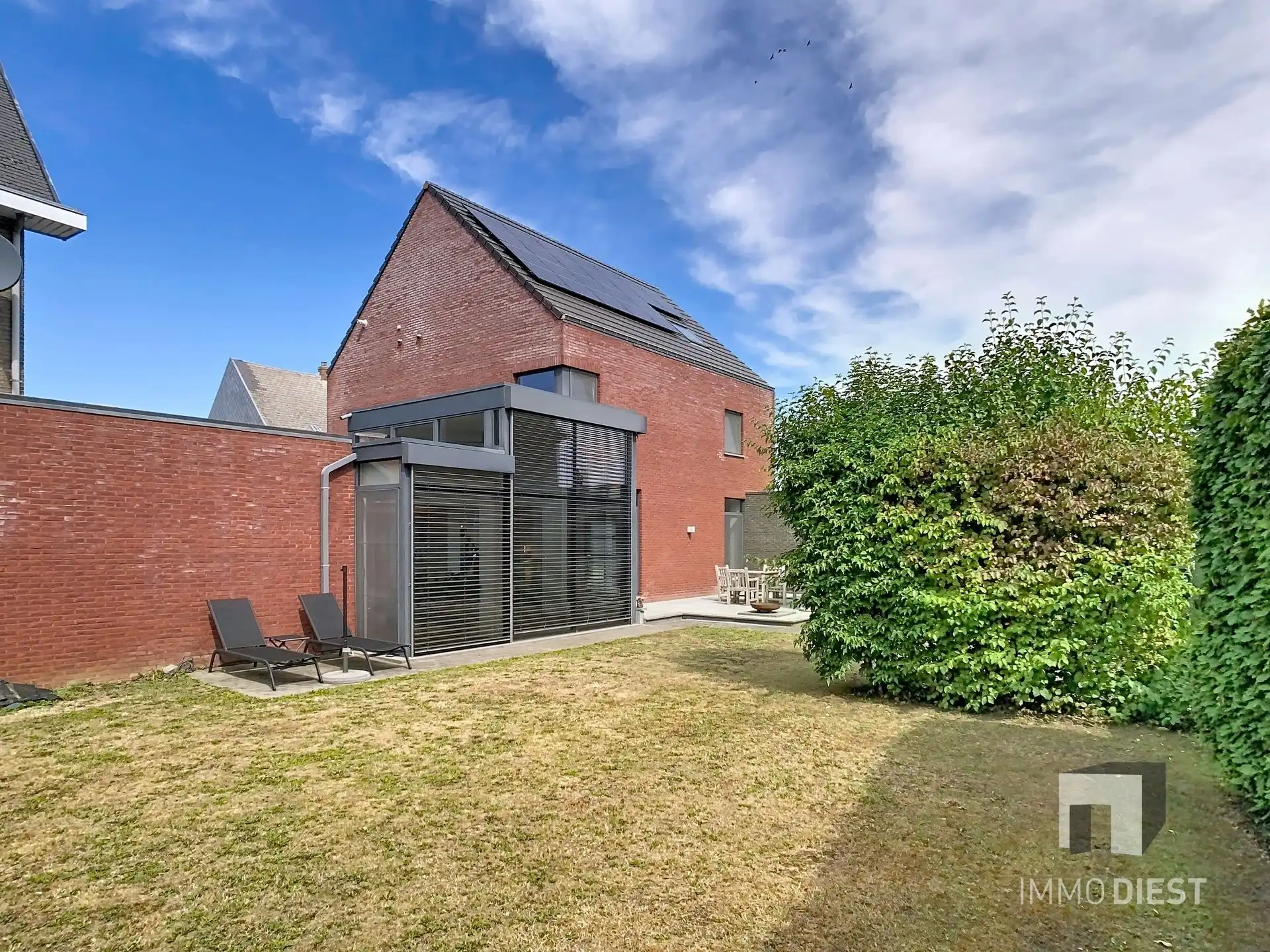 Moderne, lichtrijke woning met aangename tuin aan de voet van hartje Scherpenheuvel. foto 38