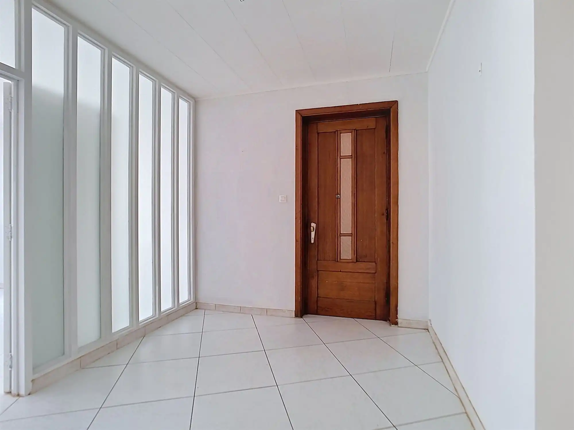 Gelijkvloers appartement met 2 slaapkamers, polyvalente ruimte en garage foto 6