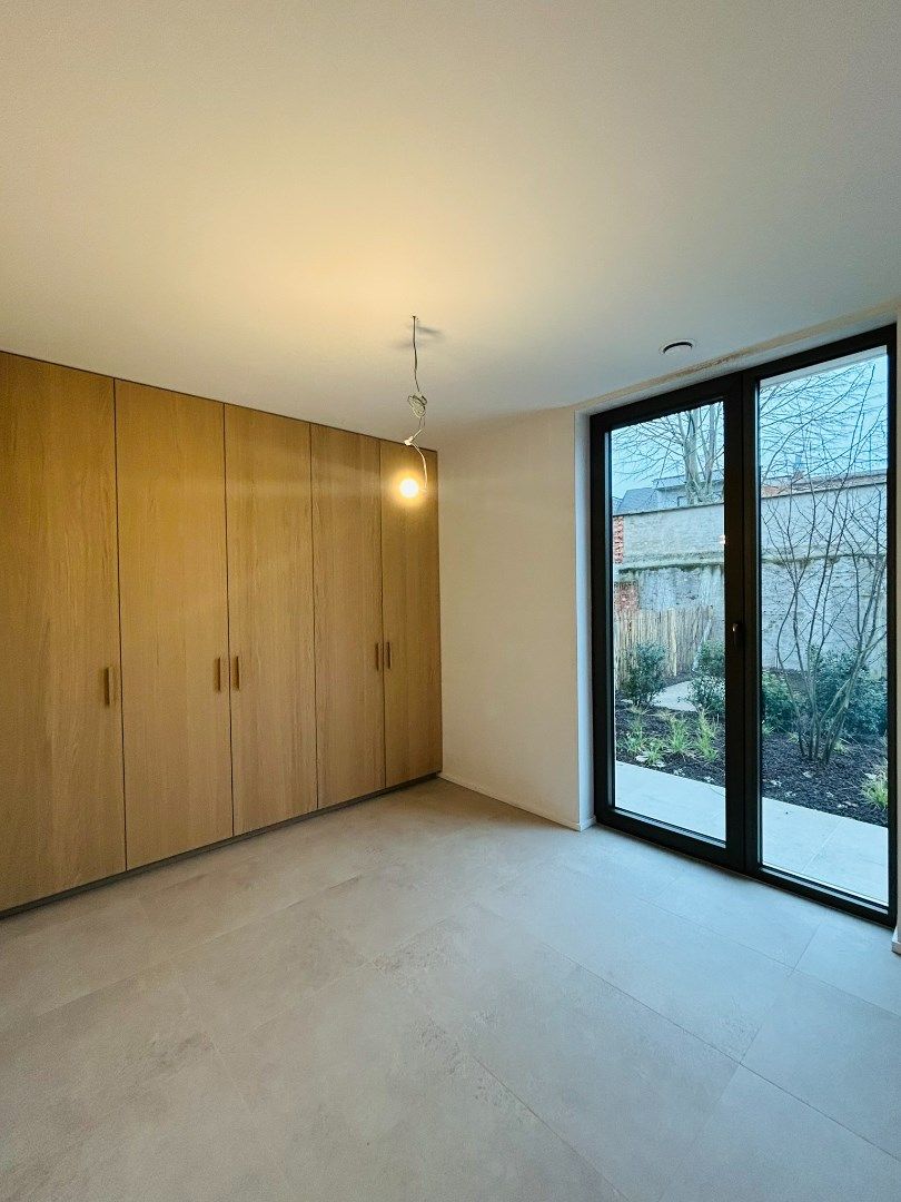 Nieuwbouw-gelijkvloers appartement met groot terras foto 12