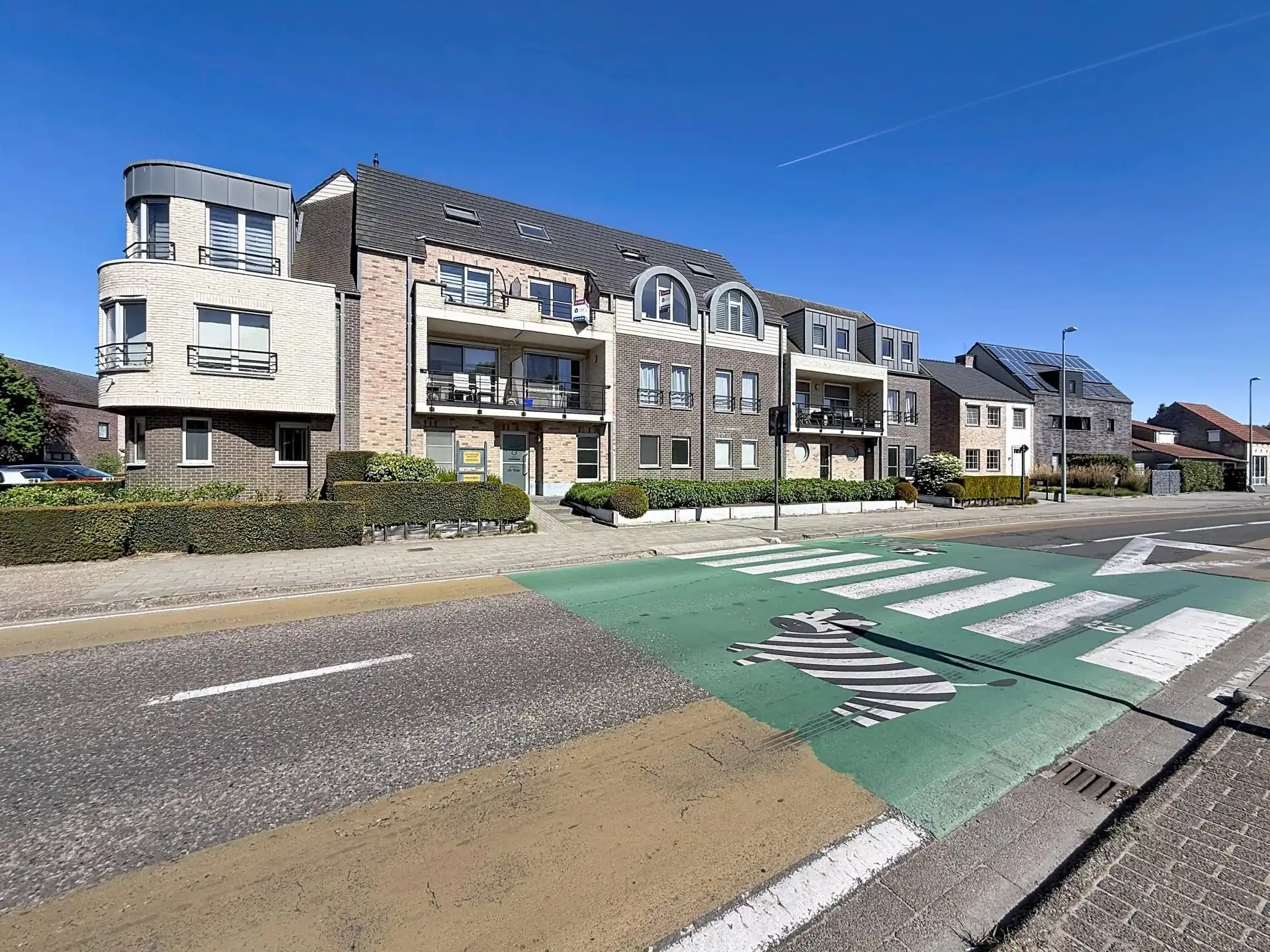 Duplex appartement met 2 slaapkamers, 2 terrassen en ondergrondse staanplaats en berging. foto 17