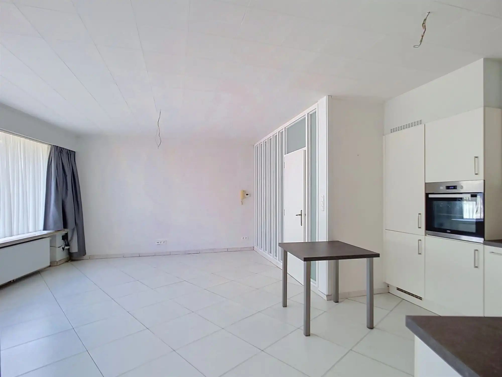 Gelijkvloers appartement met 2 slaapkamers, polyvalente ruimte en garage foto 4