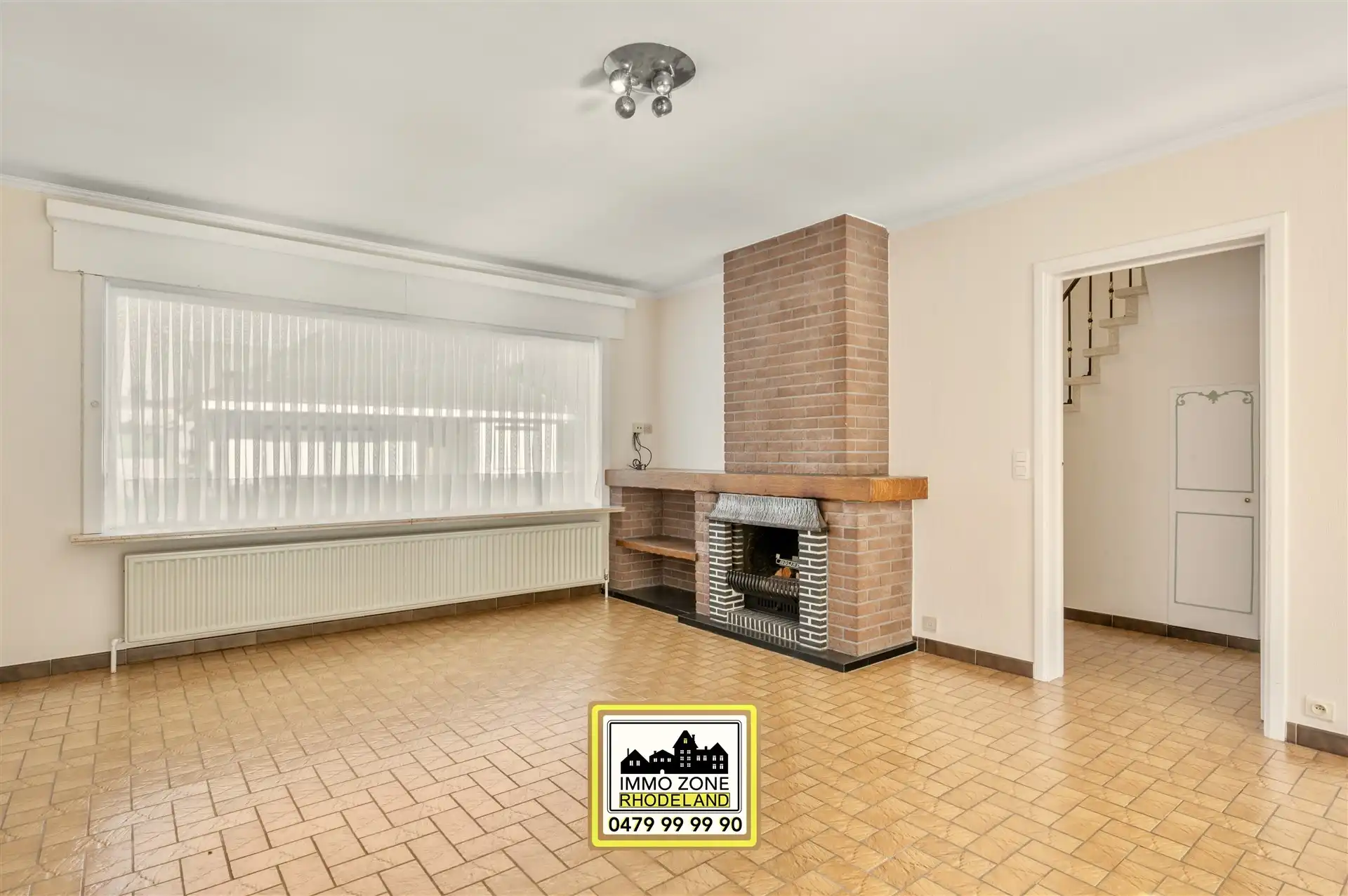 Op te frissen halfopen woning met 3 slpks, garage en tuin foto 4