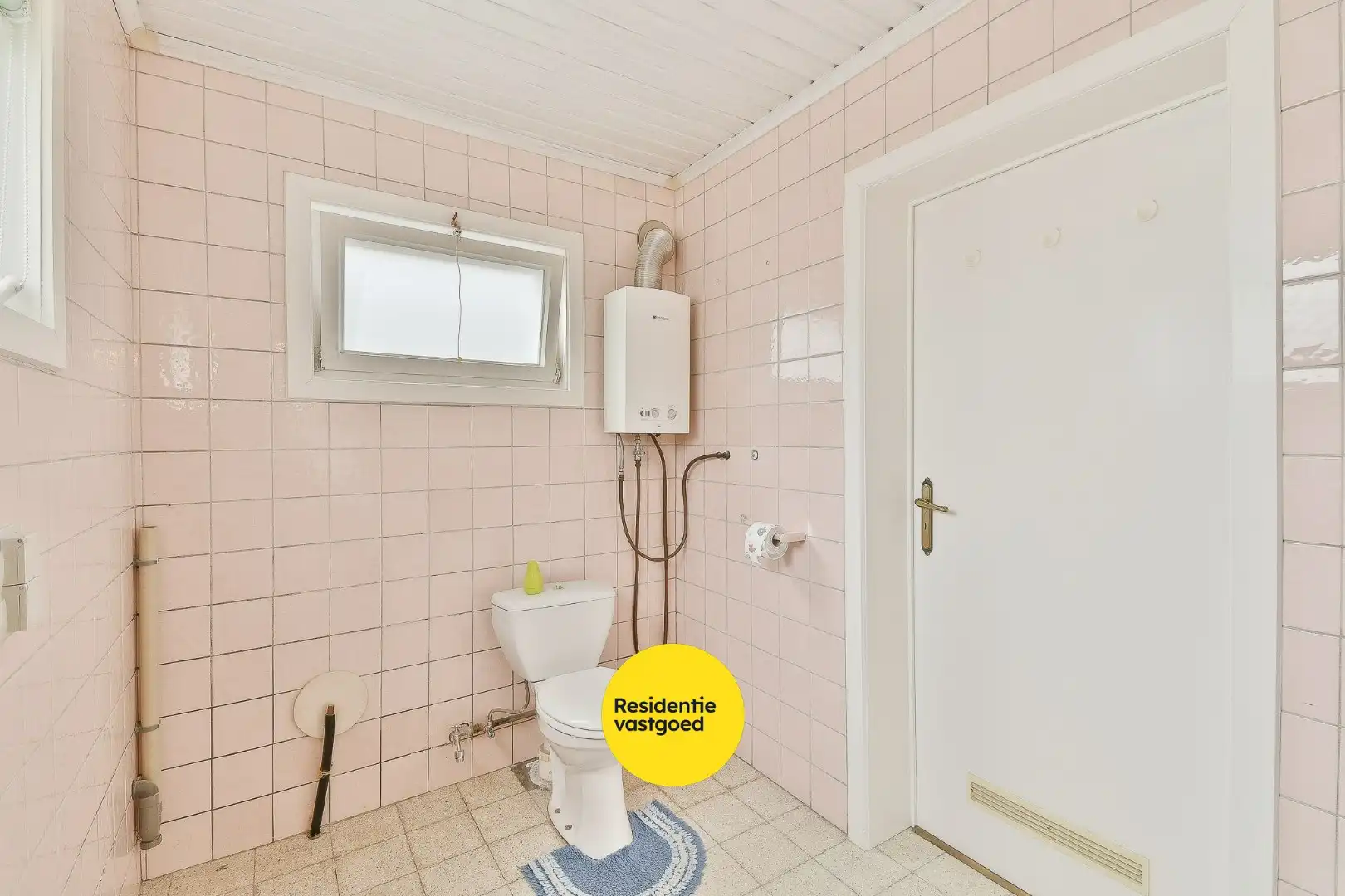 Te renoveren gezinswoning met drie slaapkamers en zongerichte tuin foto 12