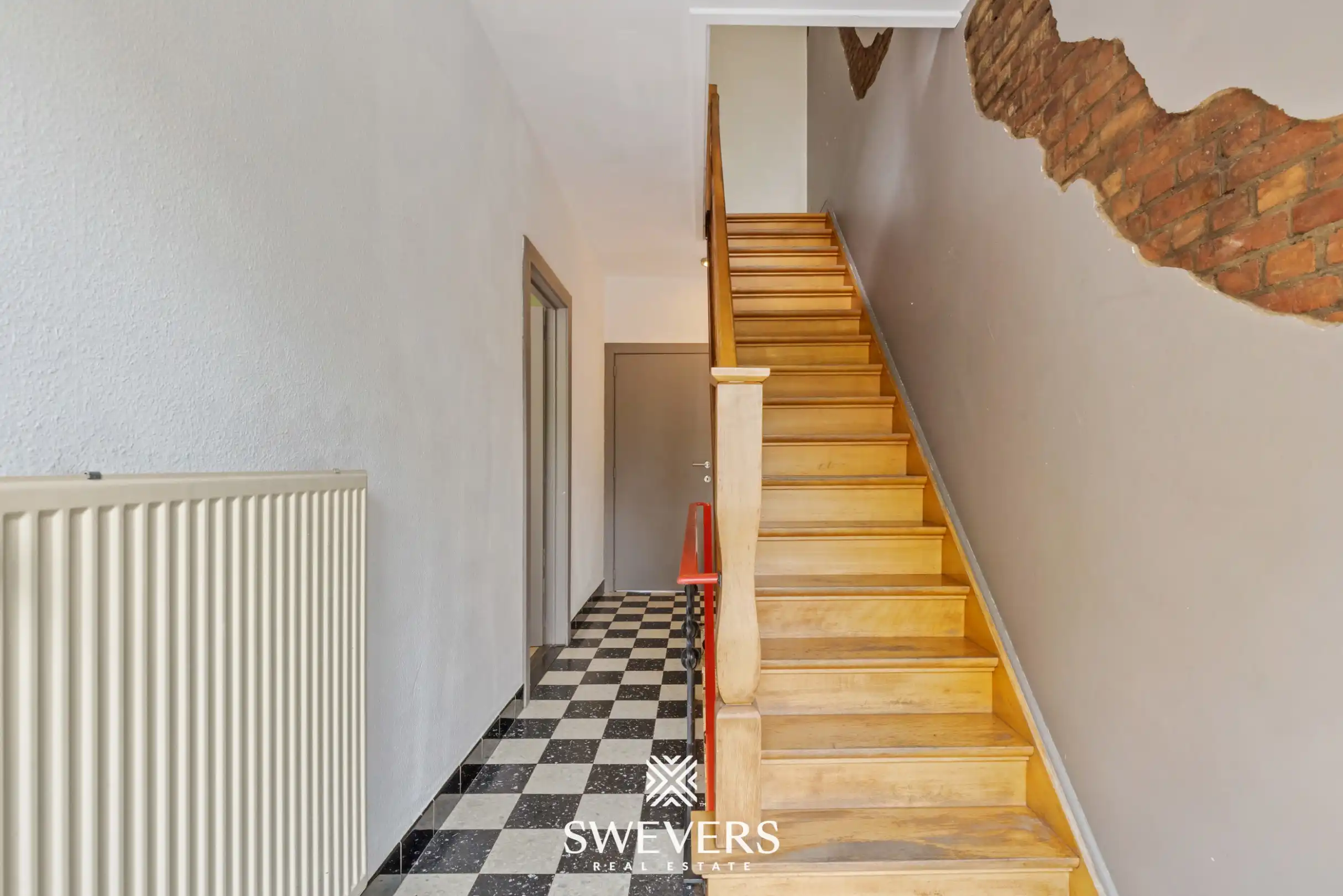 Instapklare rijwoning met 2 zeer ruime slaapkamers en uitstekende ligging foto 11