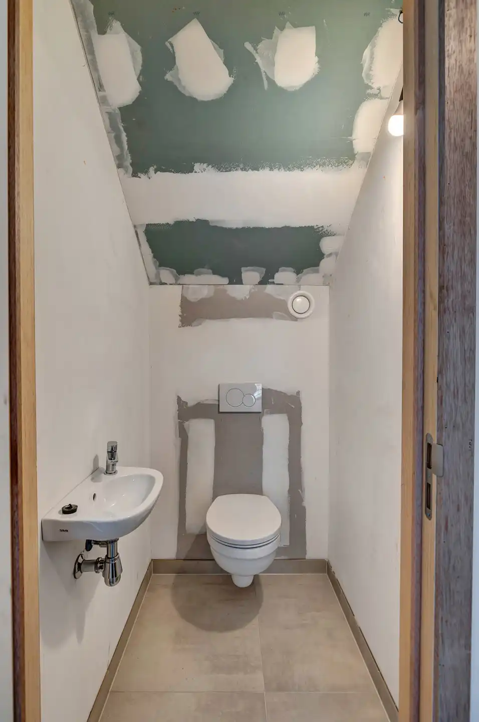 Gelijkvloers appartement met 2 slpks in uniek woonerf foto 14