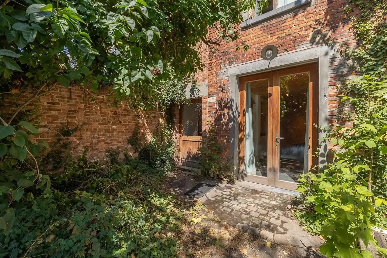 Ruim gelijkvloers appartement met zonnige tuin op toplocatie foto 31