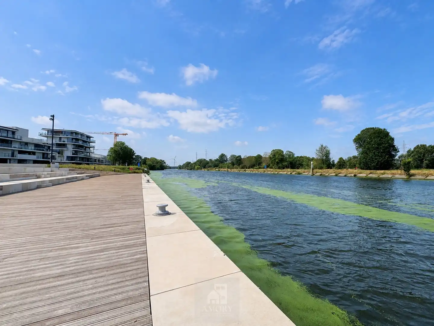 Recent gelijkvloers 2-slaapkamerappartement met tuin aan de Leieboorden foto 17
