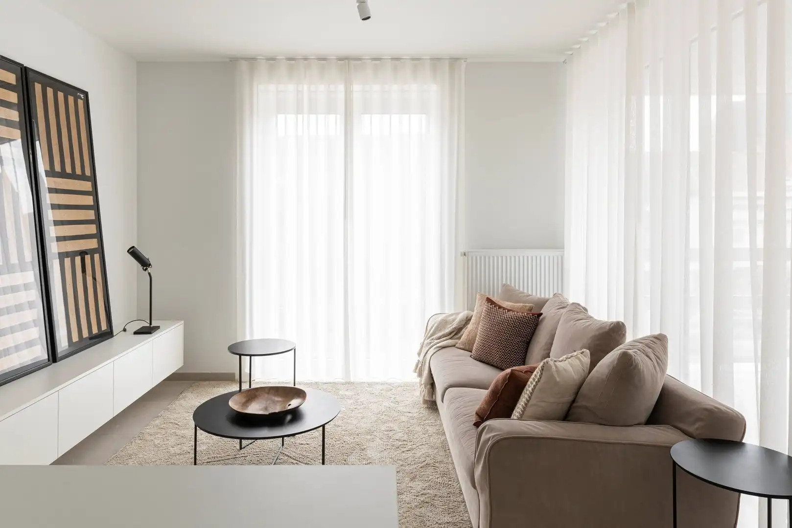 Lichtrijk recent instapklaar appartement met 2 slaapkamers, zonneterras, parking en ruime kelderberging foto 6