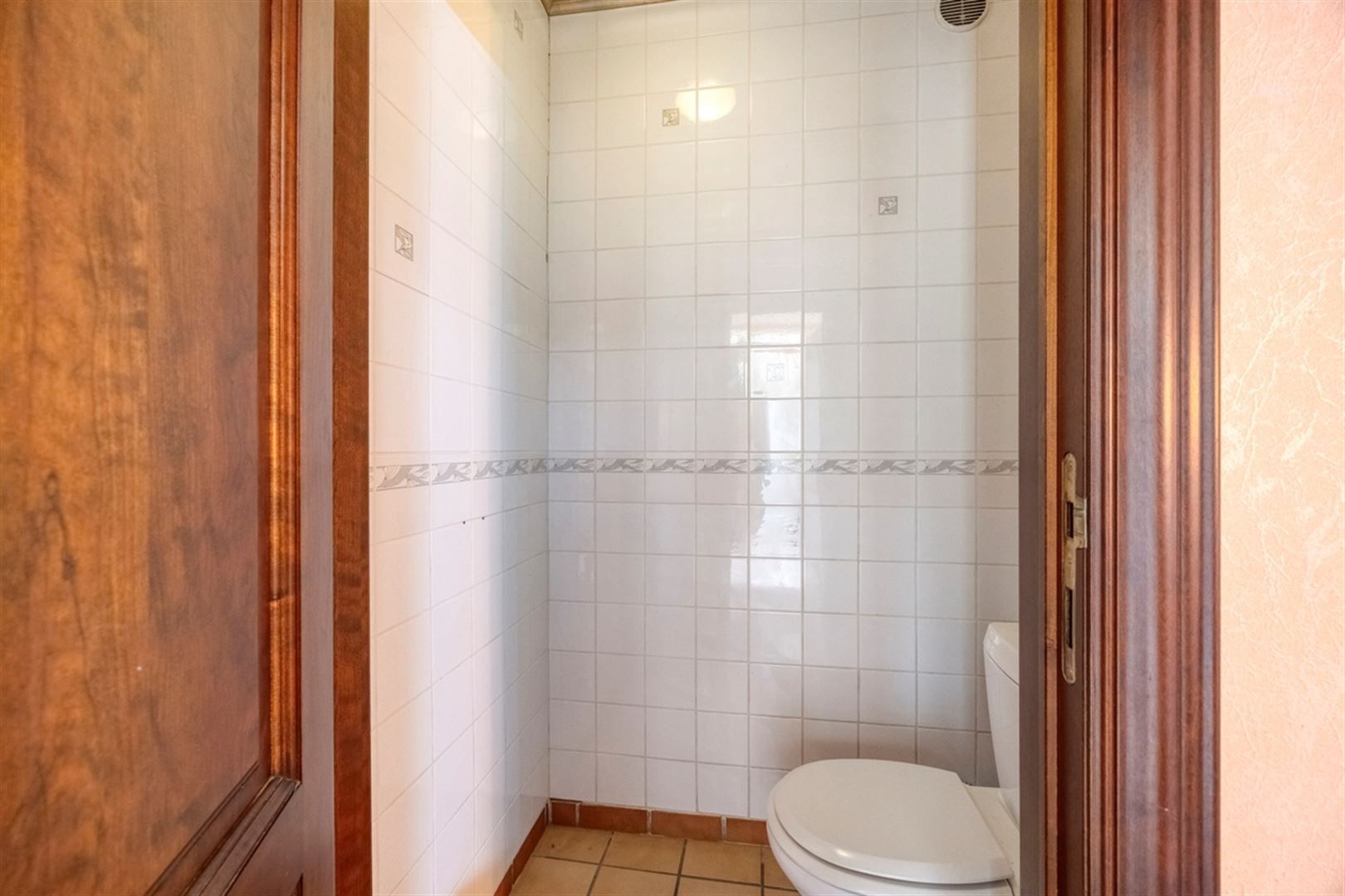 Ruime rijwoning met garage foto 12