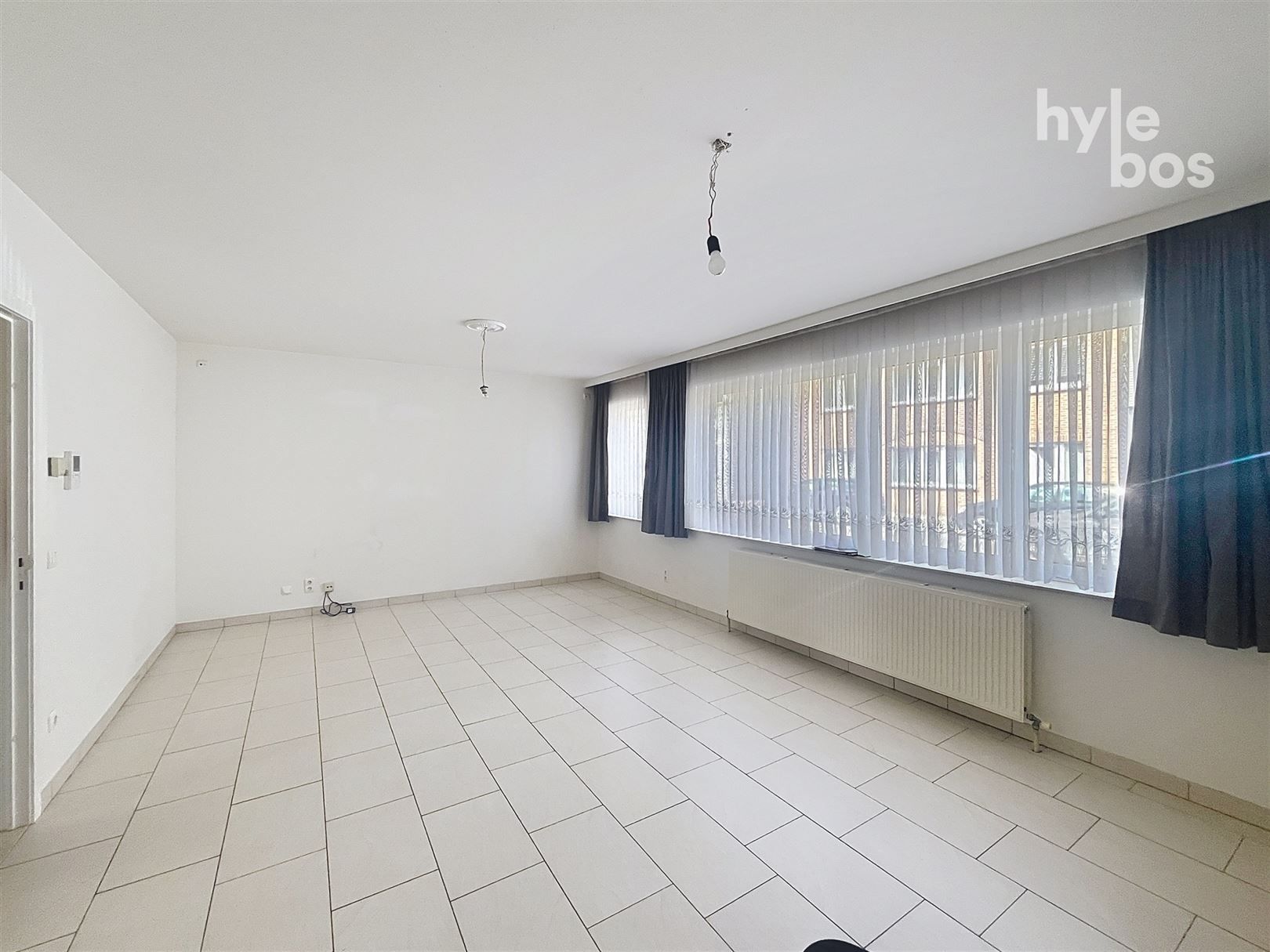 Gelijkvloers 3 slaapkamer appartement met tuin en garage foto 3