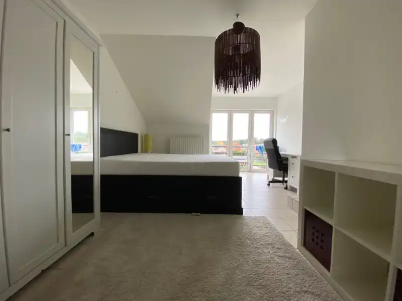 Ruim duplexappartement met 3 slaapkamers foto 6