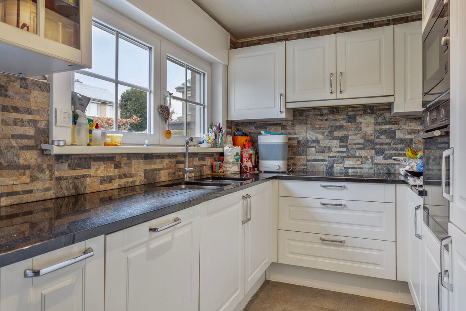 immo DAVID stelt voor: 3-gevel woning foto 6