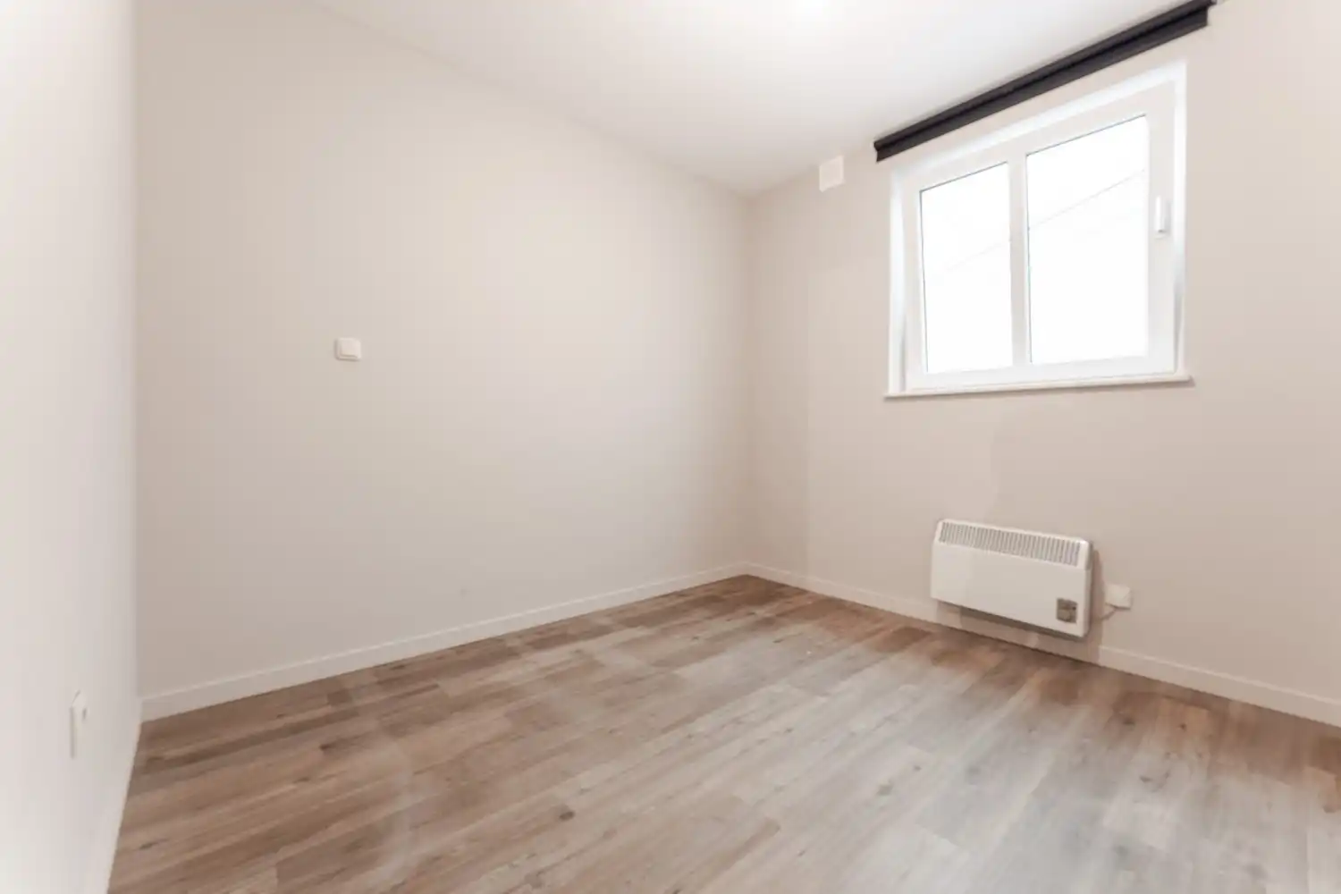 Ruim gelijkvloers appartement met 2 slaapkamers en garagebox nabij het centrum van Bree. foto 19