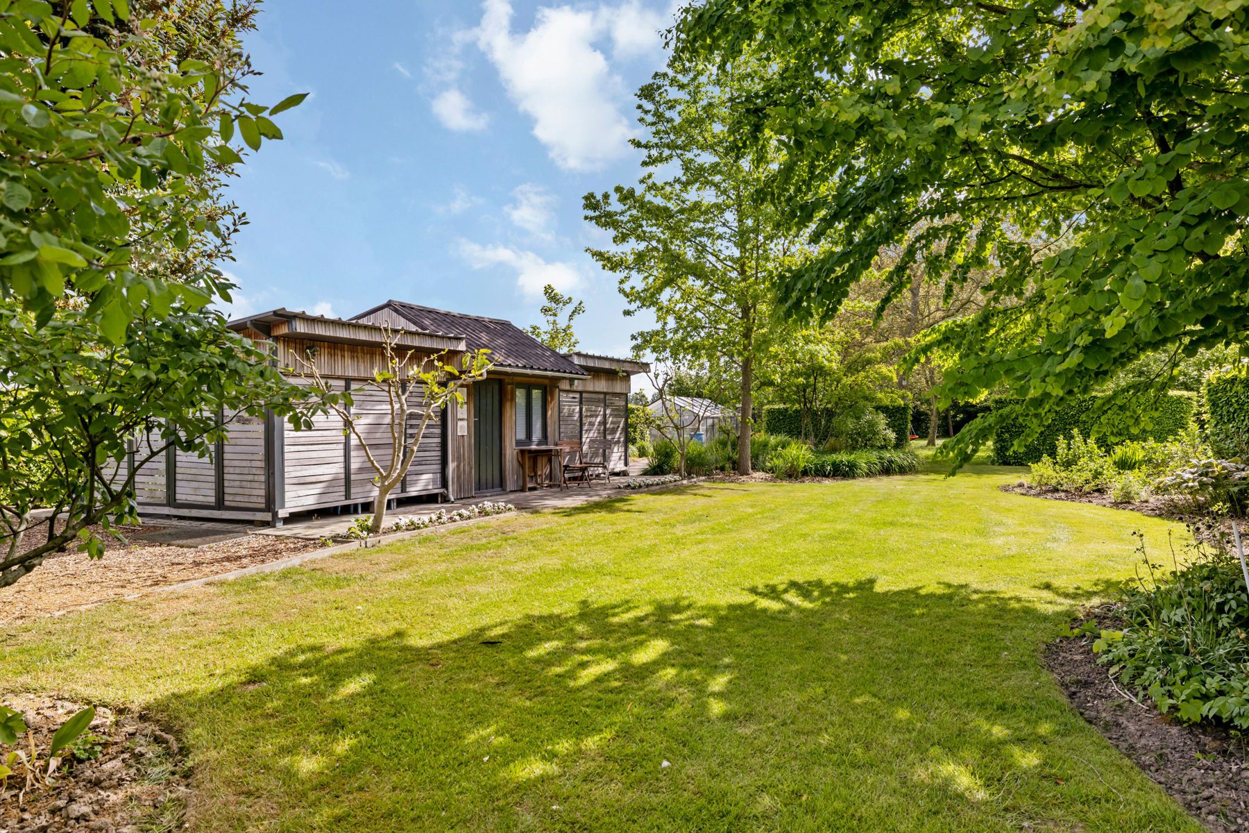 Open bebouwing met 360° landelijk zicht en 2 garages foto 10