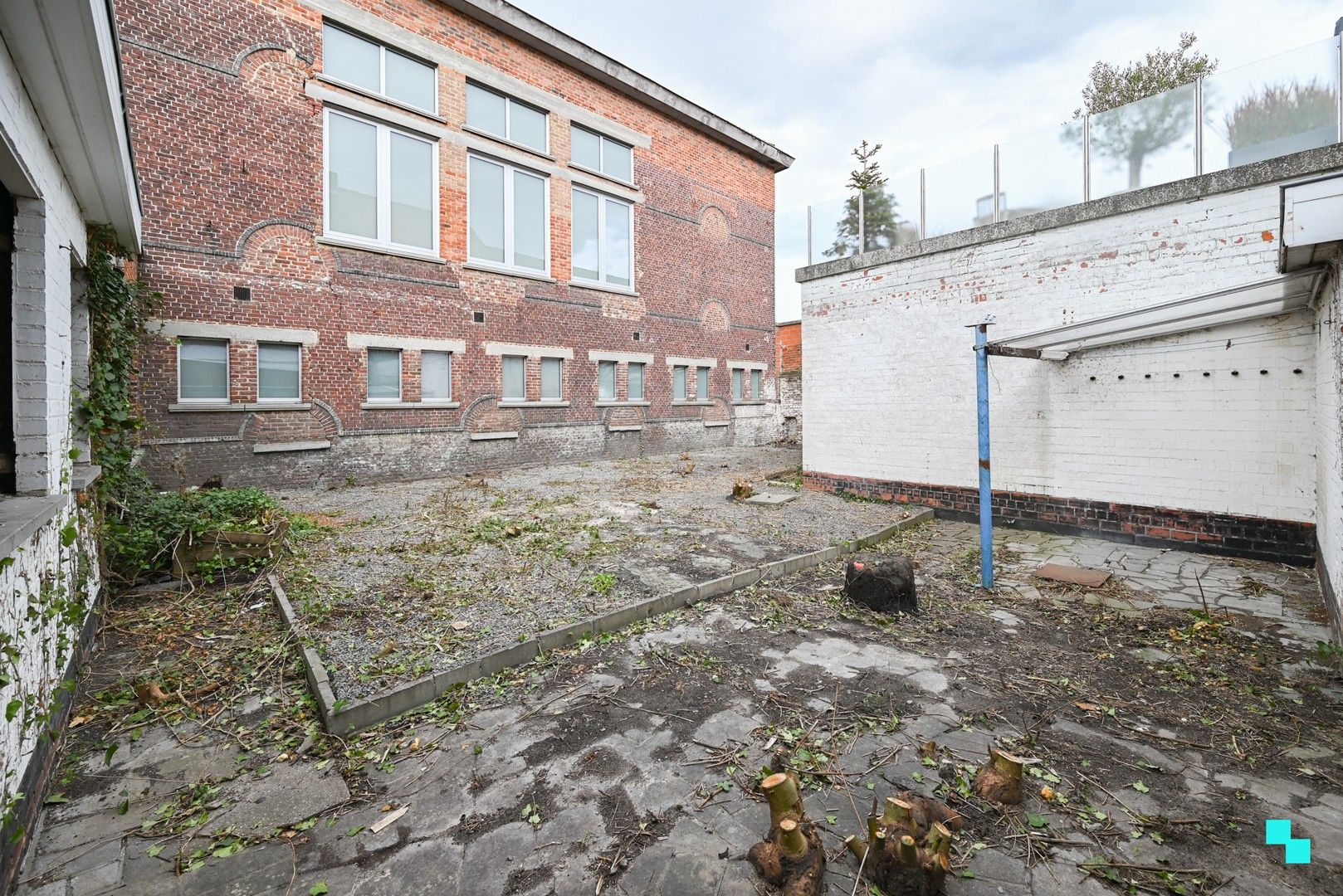 Zeer ruime, te renoveren handelswoning in hartje Ingelmunster foto 11