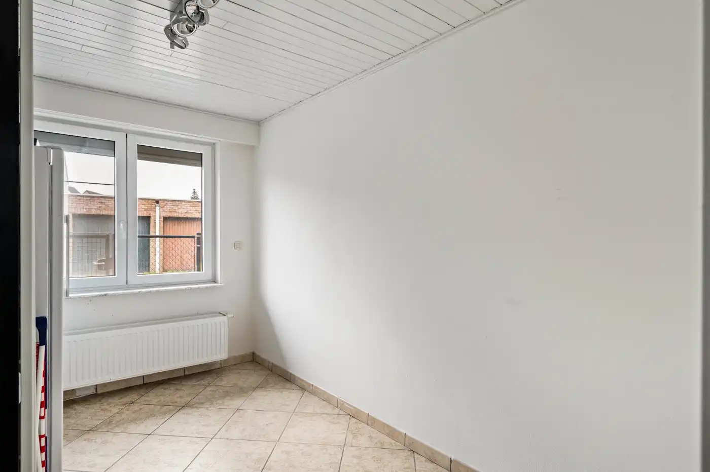 Keurig gelijkvloers appt. met 2 slpk., terras, voortuintje en garagebox foto 14