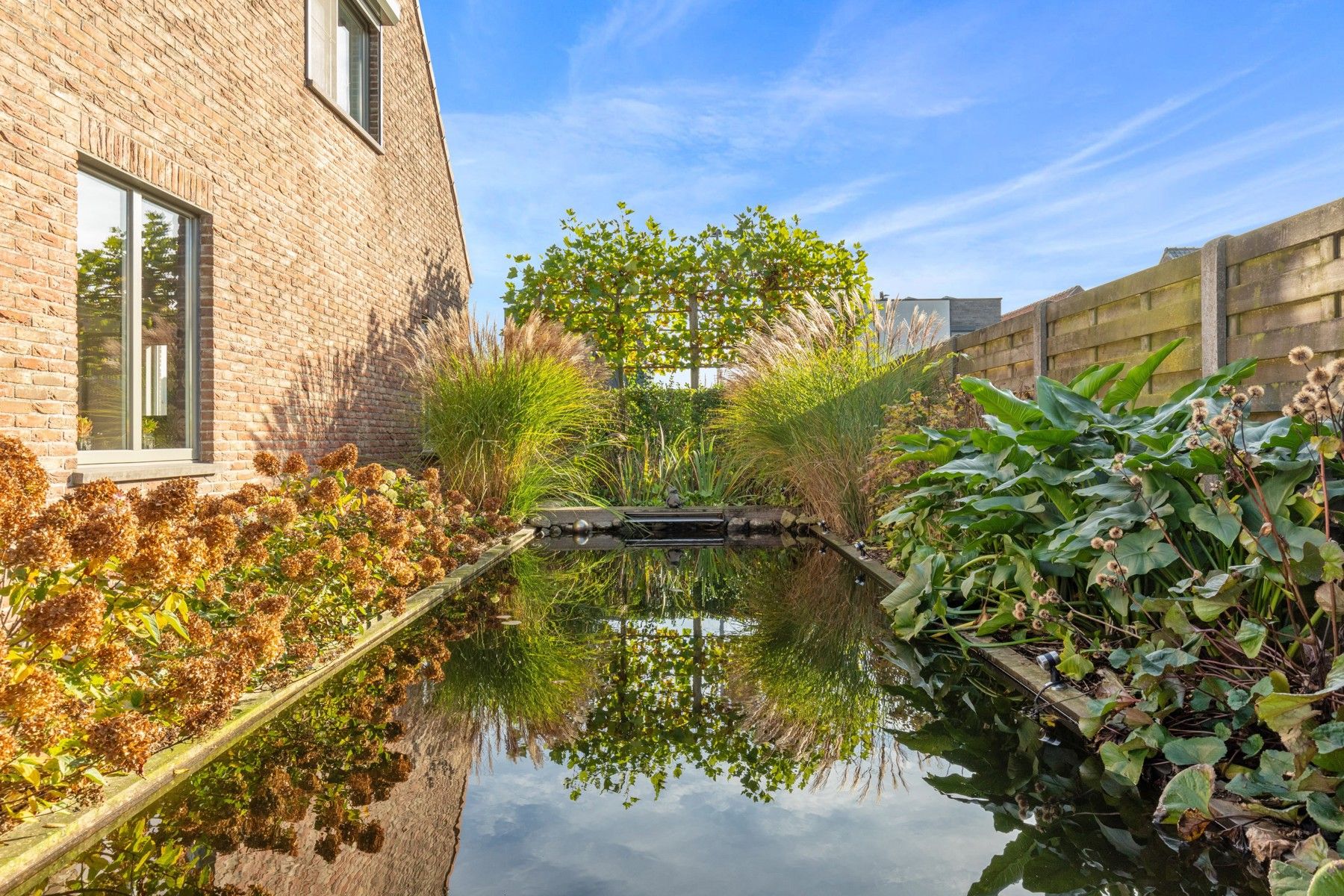 Charmante alleenstaande woning met ongelooflijke tuin foto 13