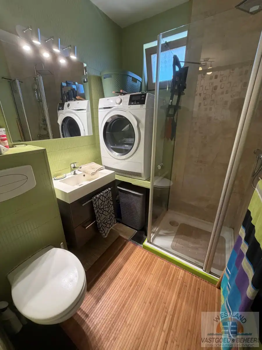 Lichtrijk hoekappartement met 1 slaapkamer foto 8