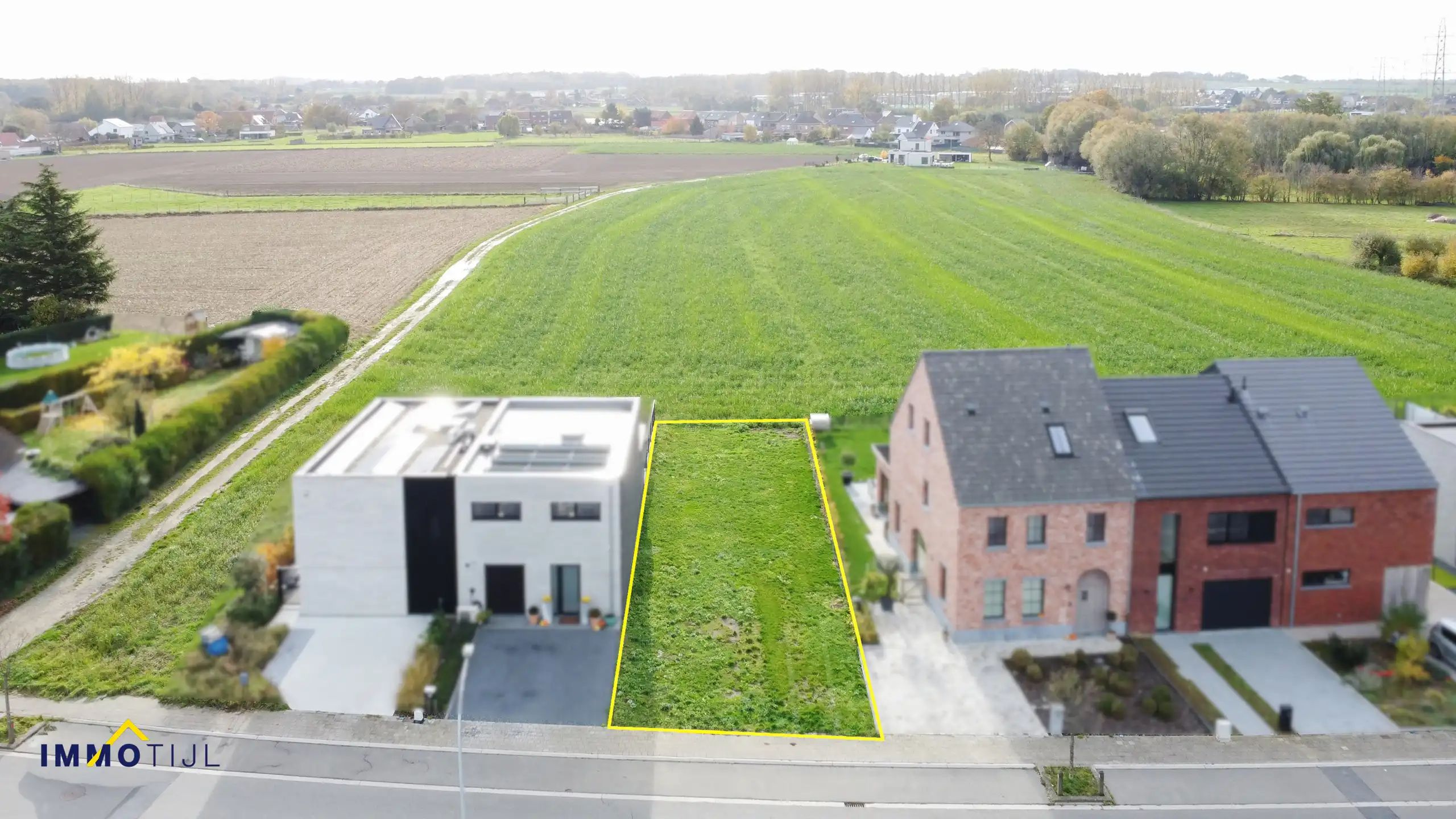 Unieke bouwgrond voor een halfopen bebouwing te Merchtem! foto {{pictureIndex}}