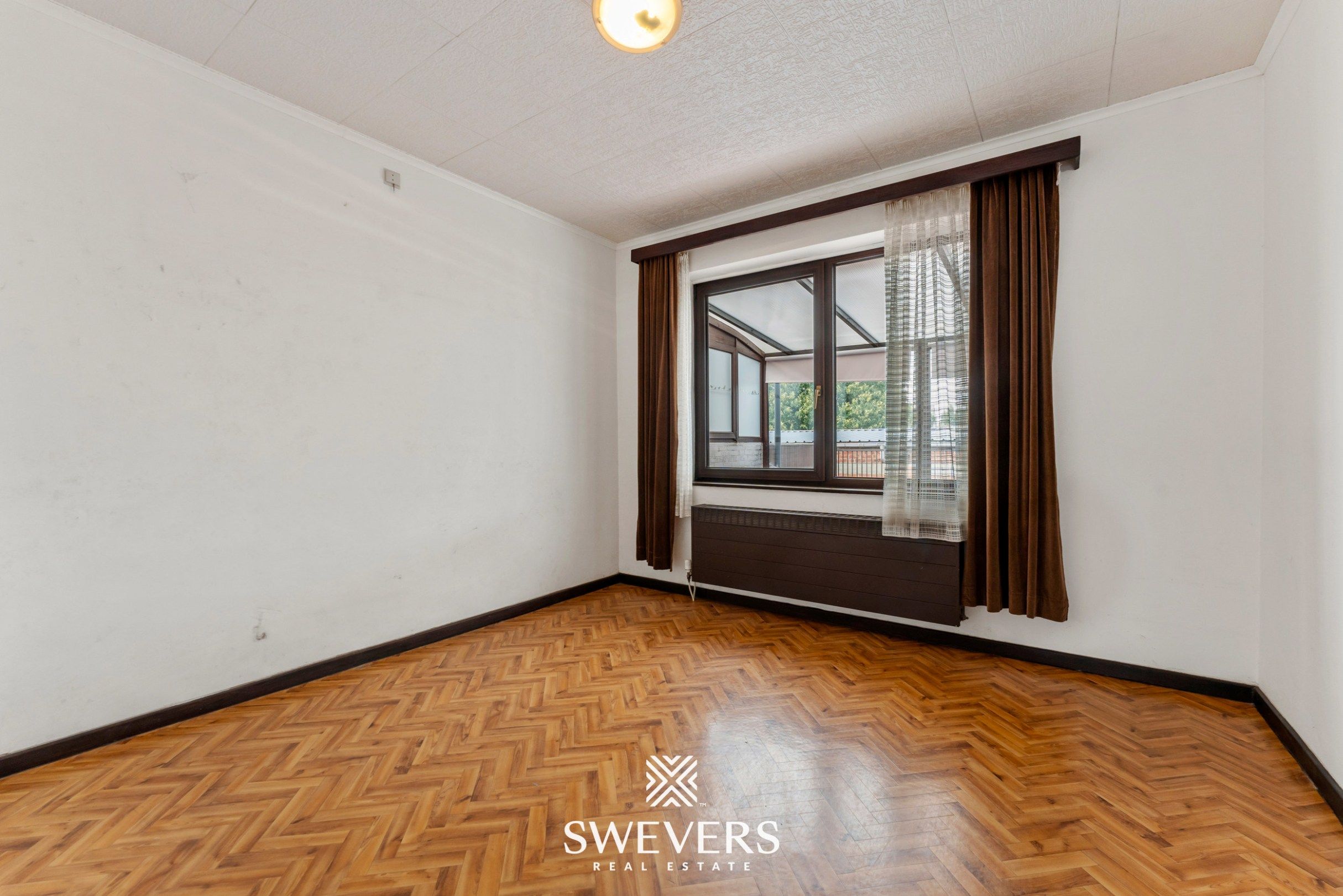 Ruim appartement met zonrijke veranda, terras én parkeergarage op boogscheut van Hasselt-centrum. foto 12