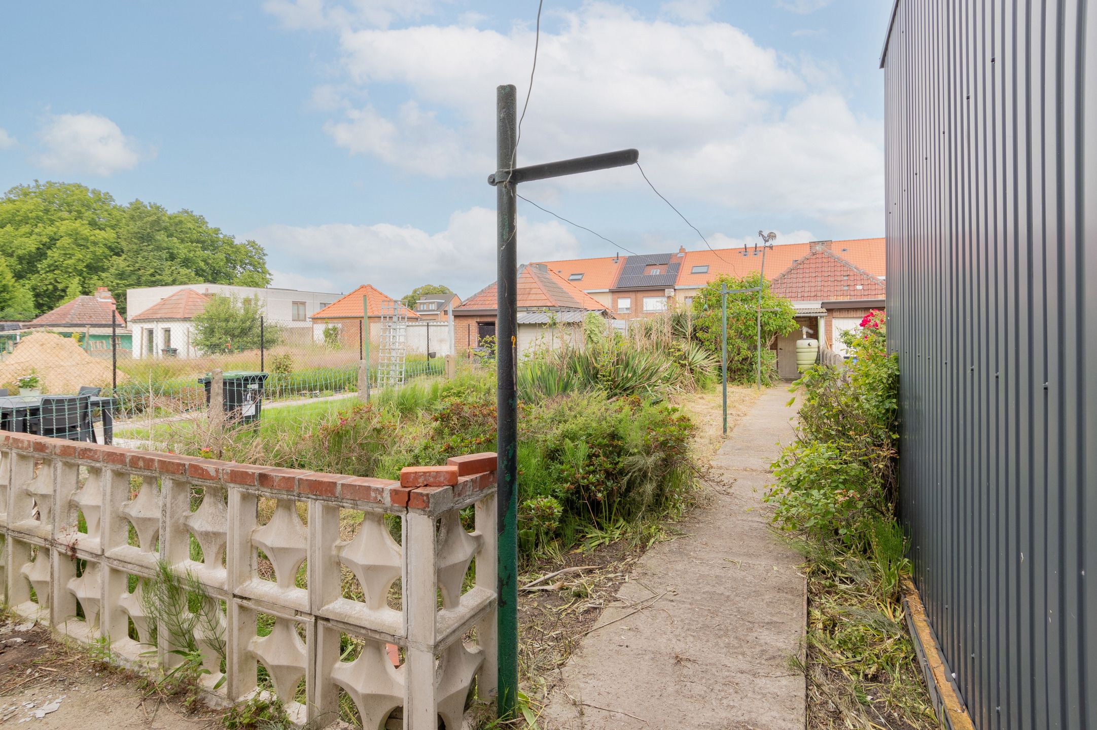 Knusse te renoveren woning met leuke tuin foto 20