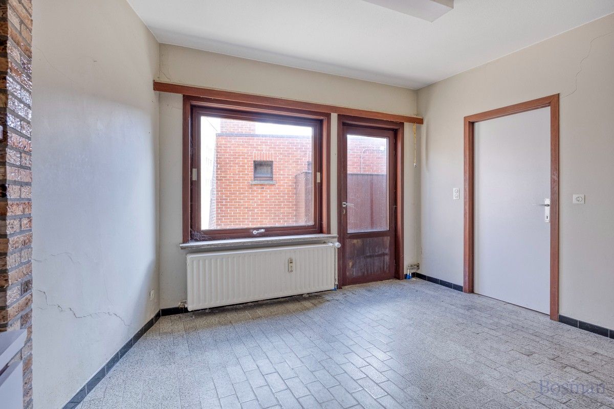 Halfopen bebouwing met 5 garageboxen te koop in Ham foto 8