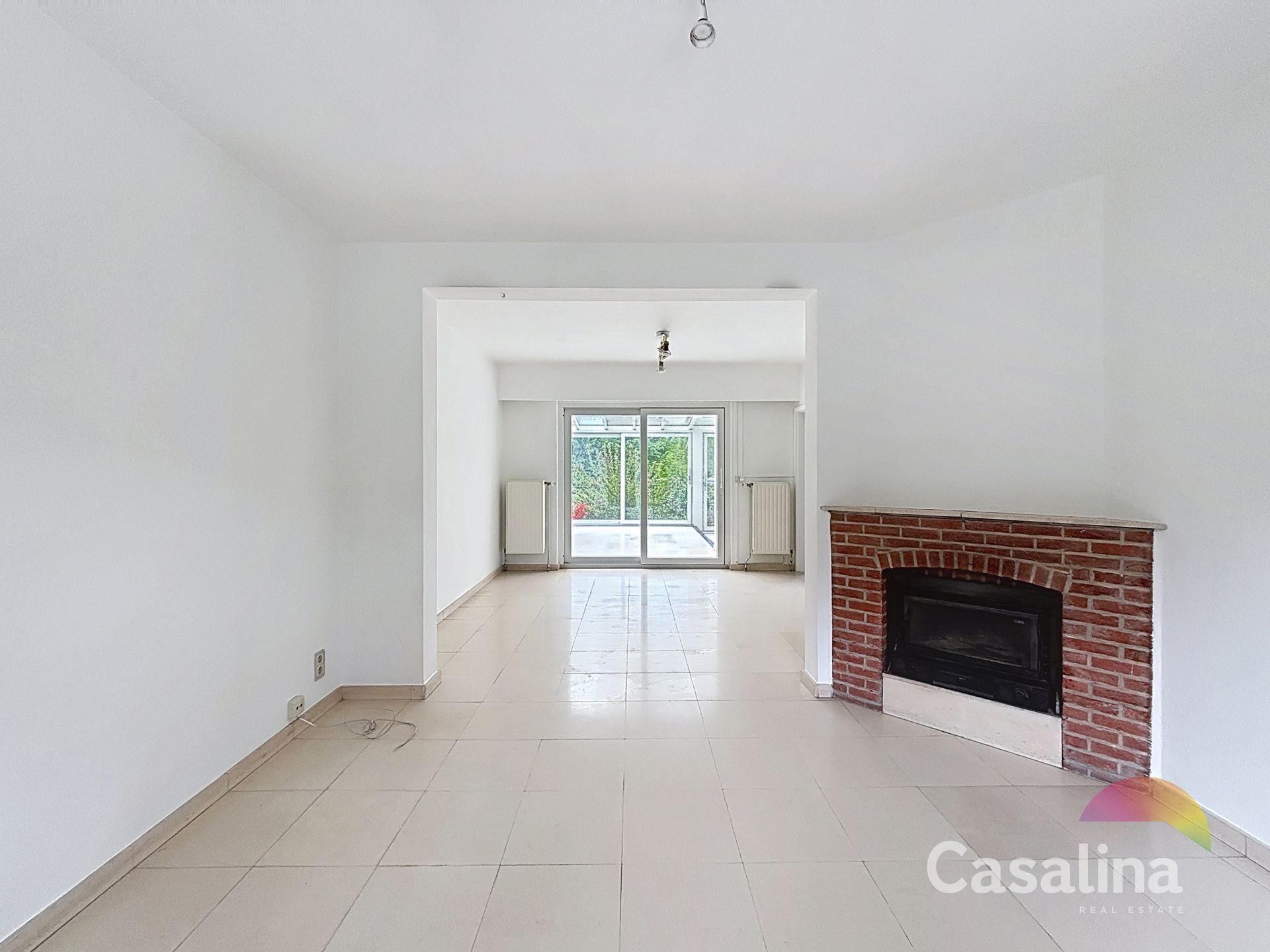 Vier gevel woning met tuin te huur  foto 2