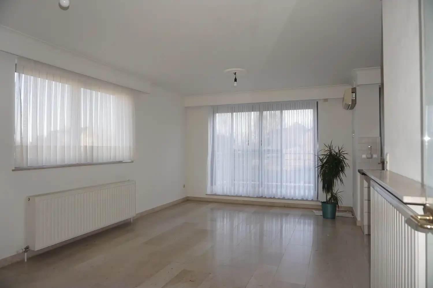 Instapklaar appartement met 2 slaapkamers, terras en dubbele ondergrondse garage – Solferinostraat 4, Paal foto 2