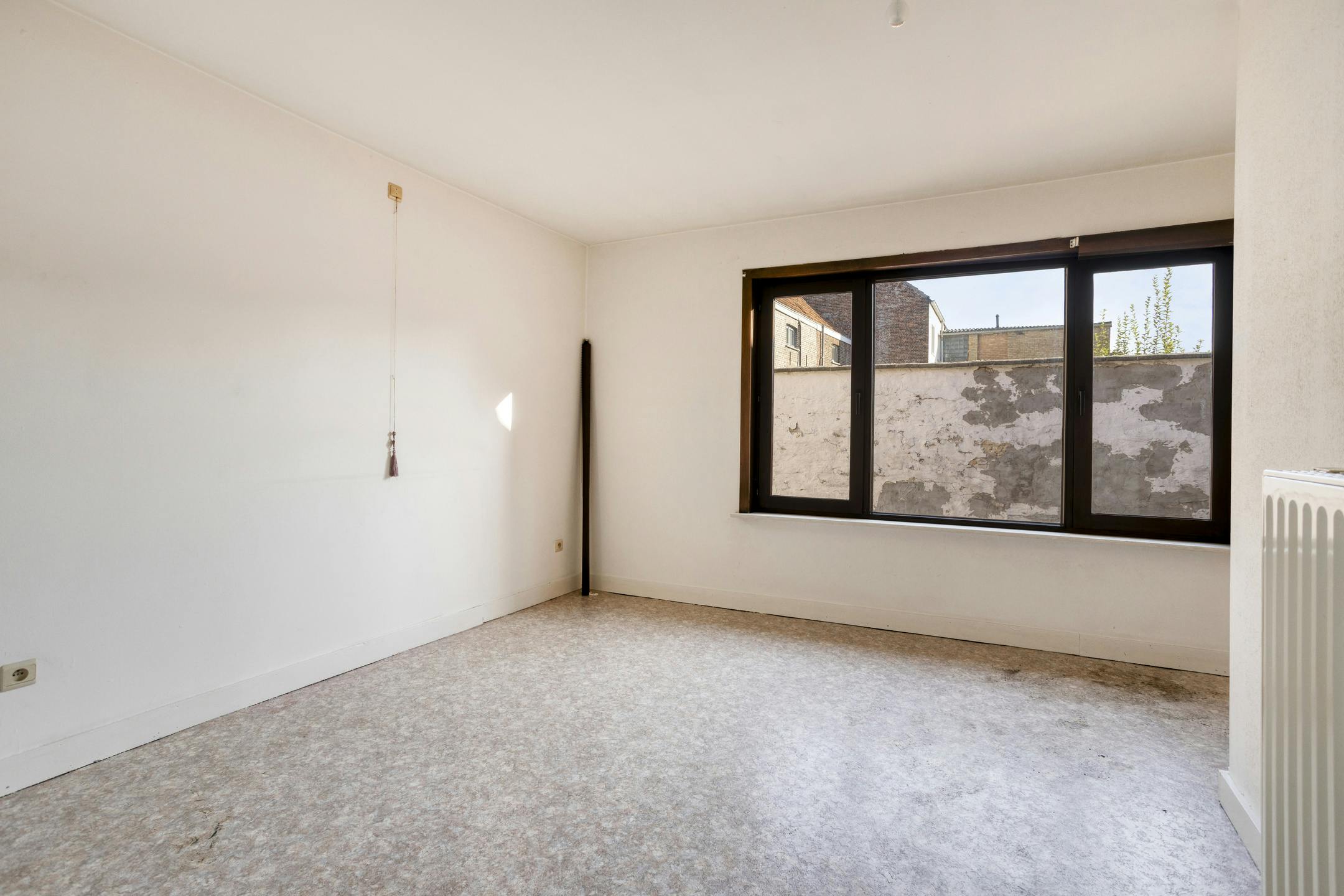 Te renoveren huis op een toplocatie in centrum Brugge foto 6