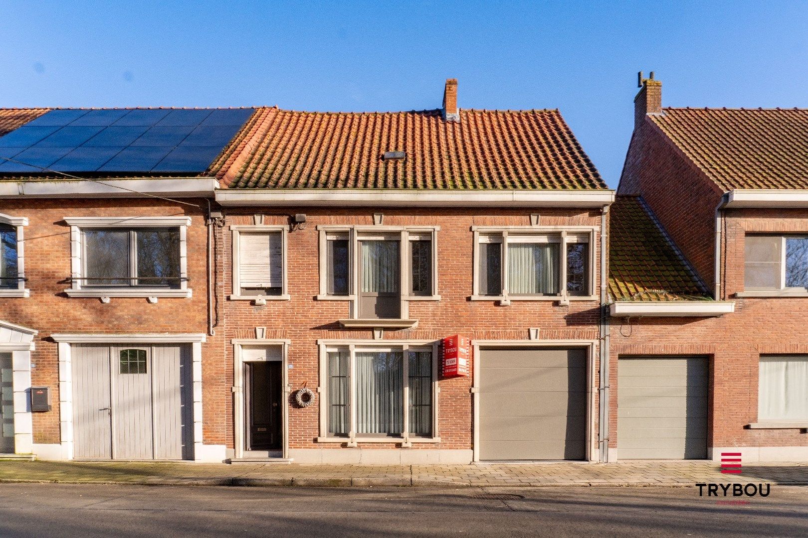 Ruime gezinswoning met 4 slaapkamers, garage en tuin foto 2