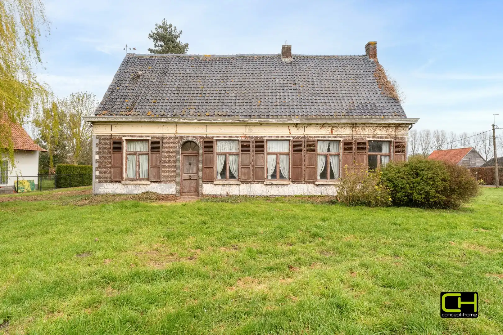 Karaktervolle hoeve met uitzonderlijk renovatiepotentieel op ruim perceel van 2.827 m² te Evergem foto 5