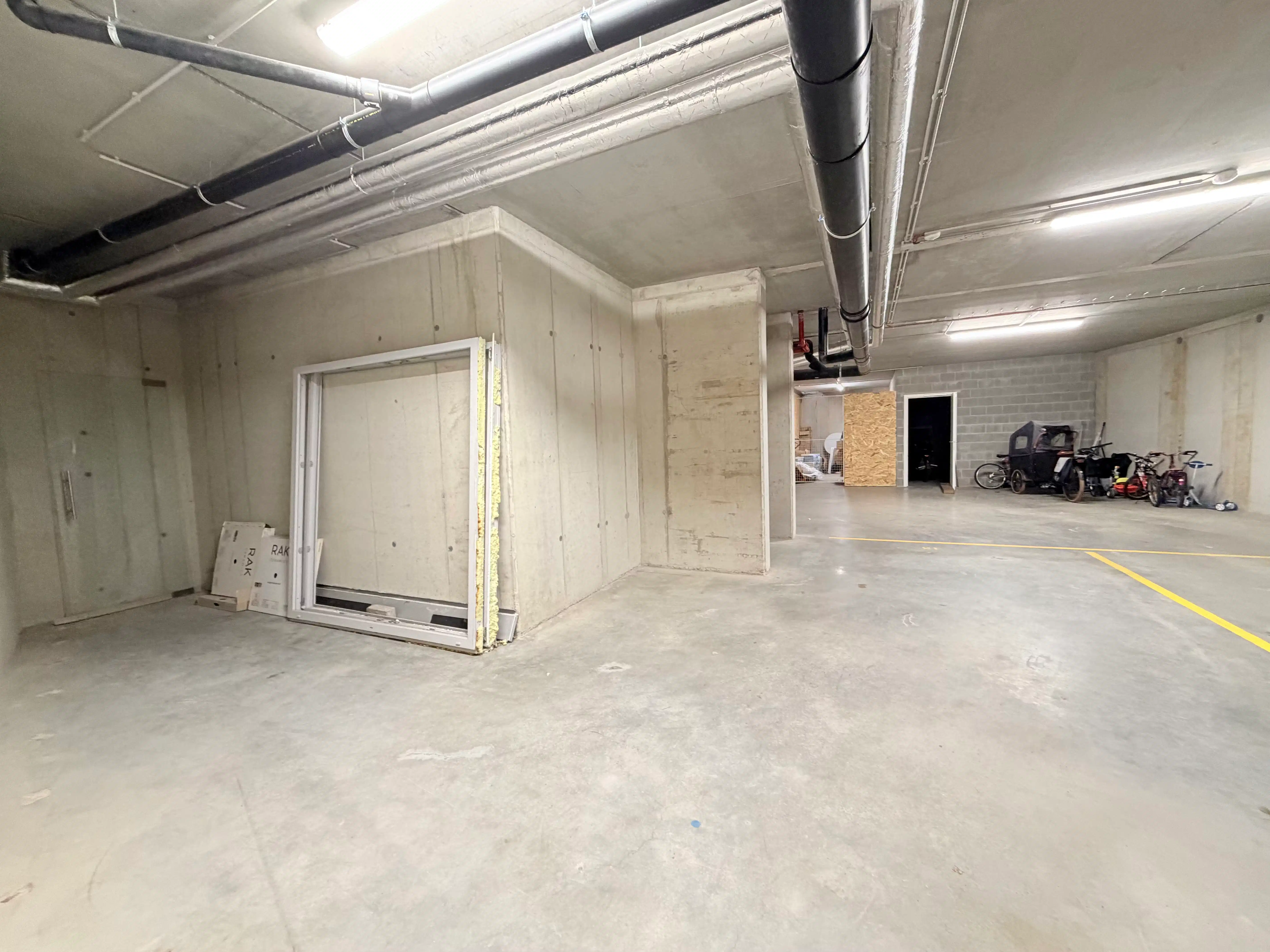 Ondergrondse autostaanplaats in centrum van Evergem foto 2