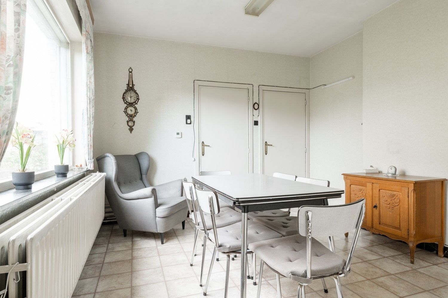 Karaktervolle woning met potentieel op toplocatie in het centrum van Hechtel foto 8