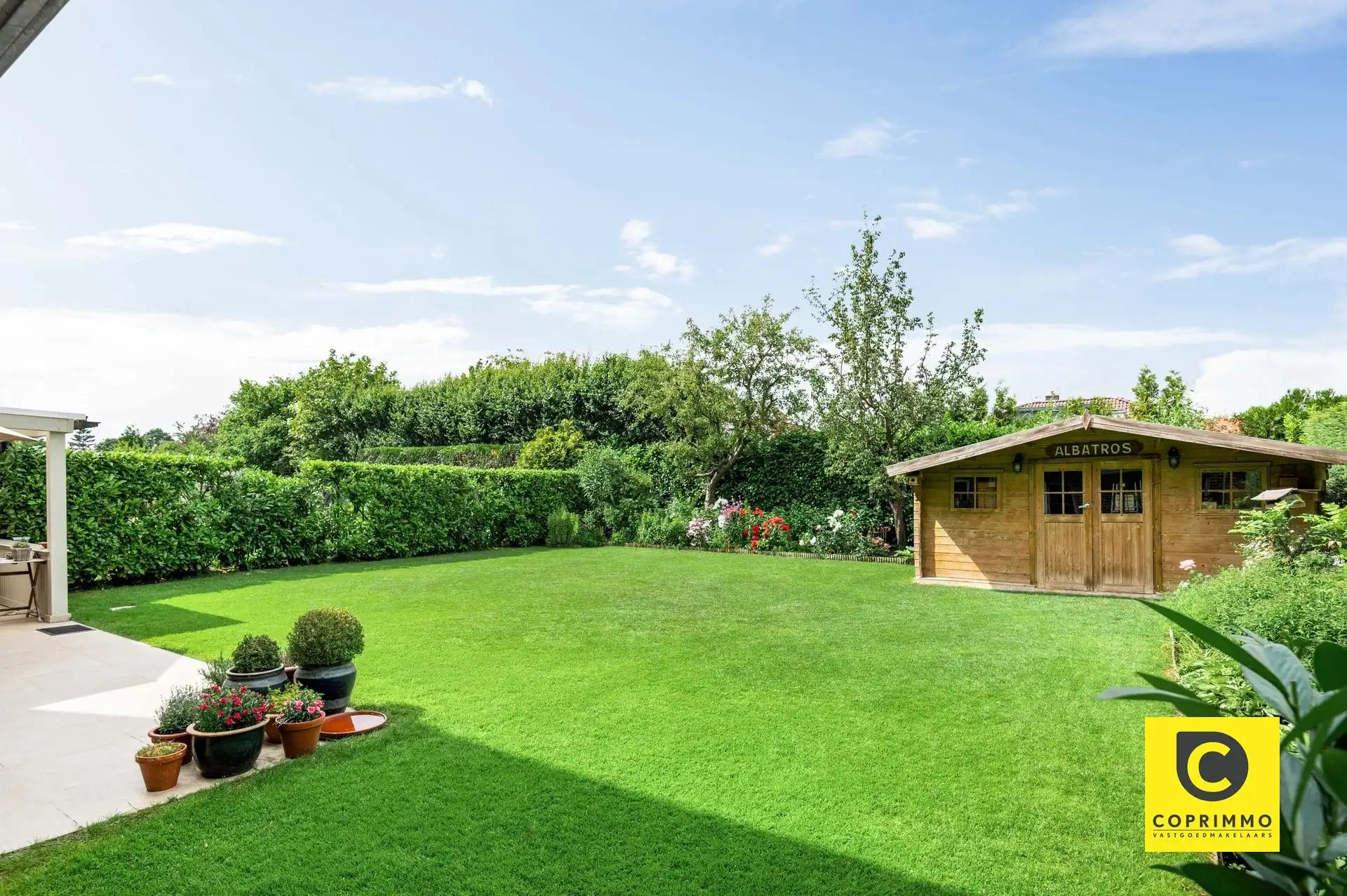 Gelijkvloers app.: 2 slk, garage en tuin  foto 2