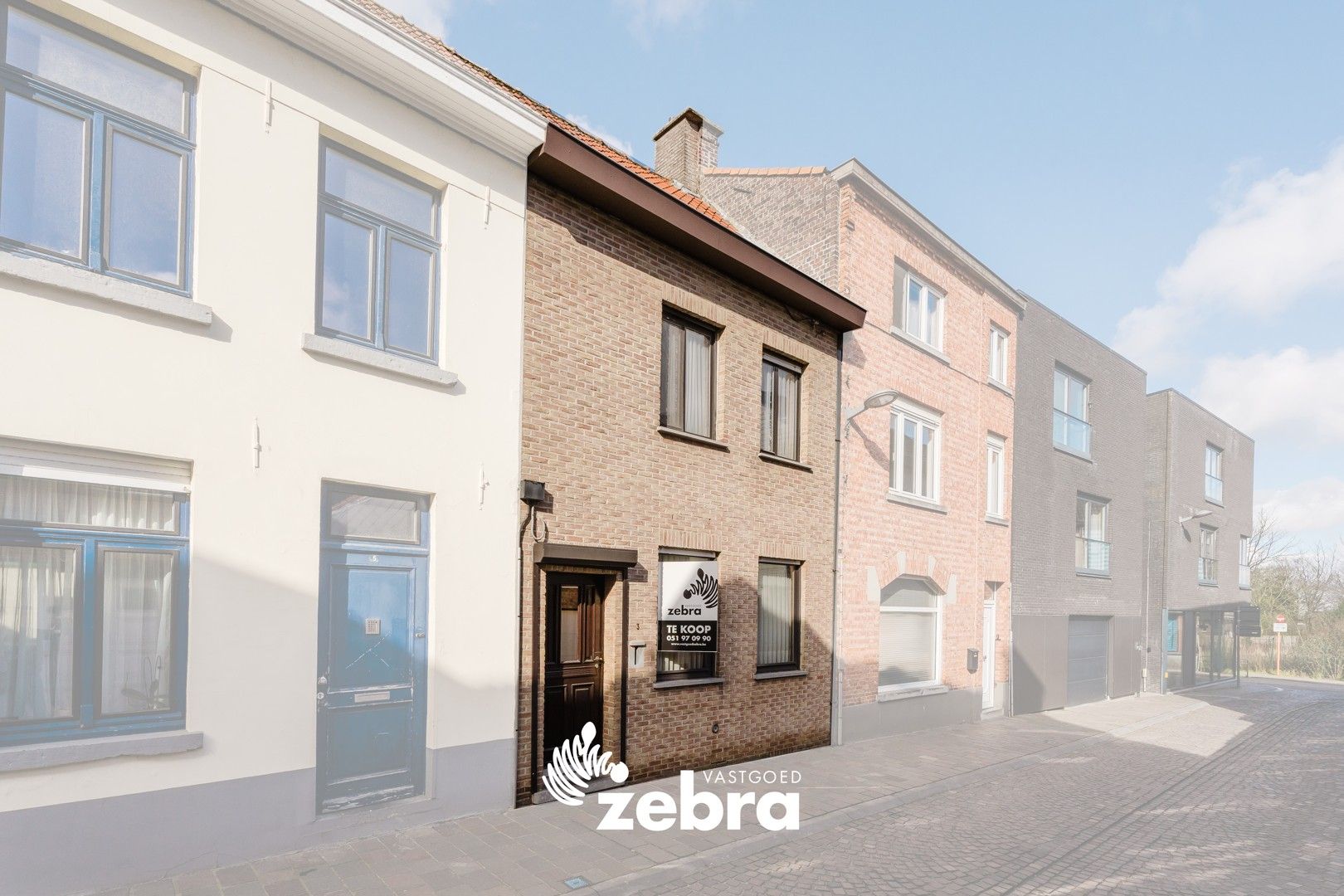 Te renoveren woning op een steenworp van de markt in Tielt! foto 15