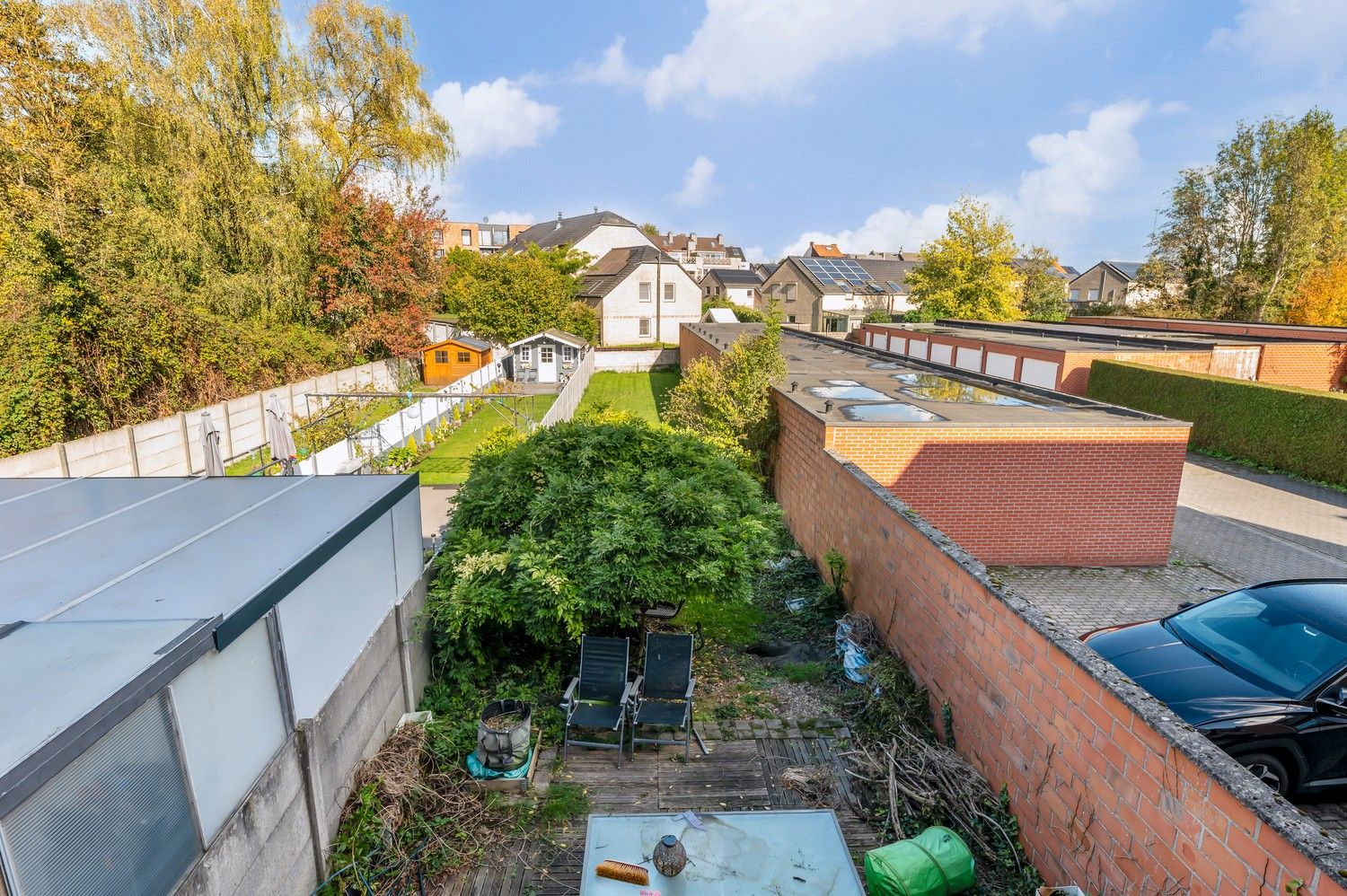 VOLLEDIG te renoveren rijwoning met inpandige garage en grote tuin op een gunstige locatie. foto 23