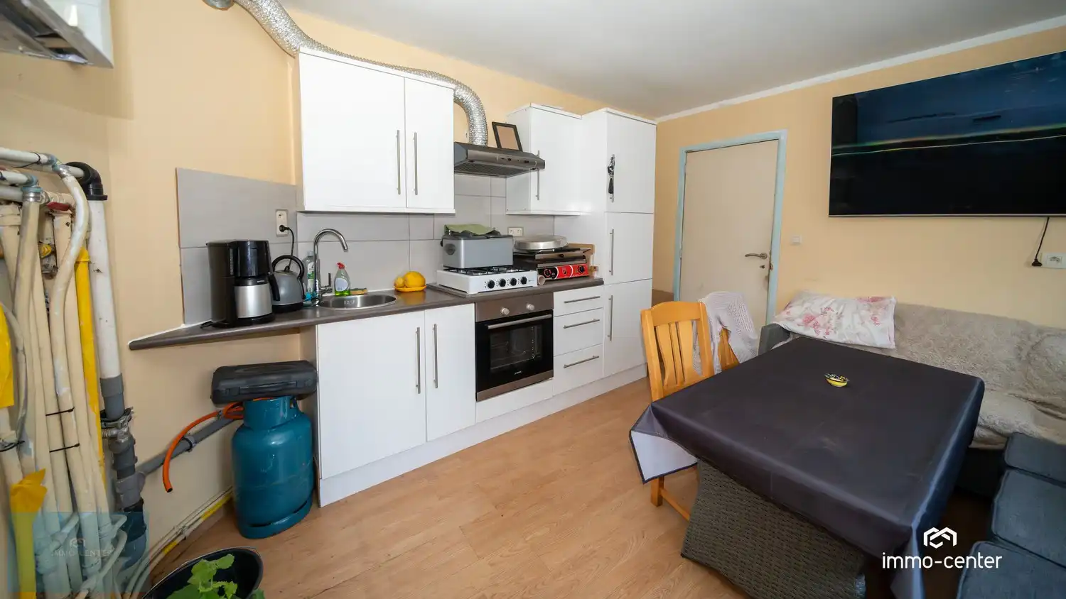 Handelspand + appartementen + parking + ruime tuin foto 5