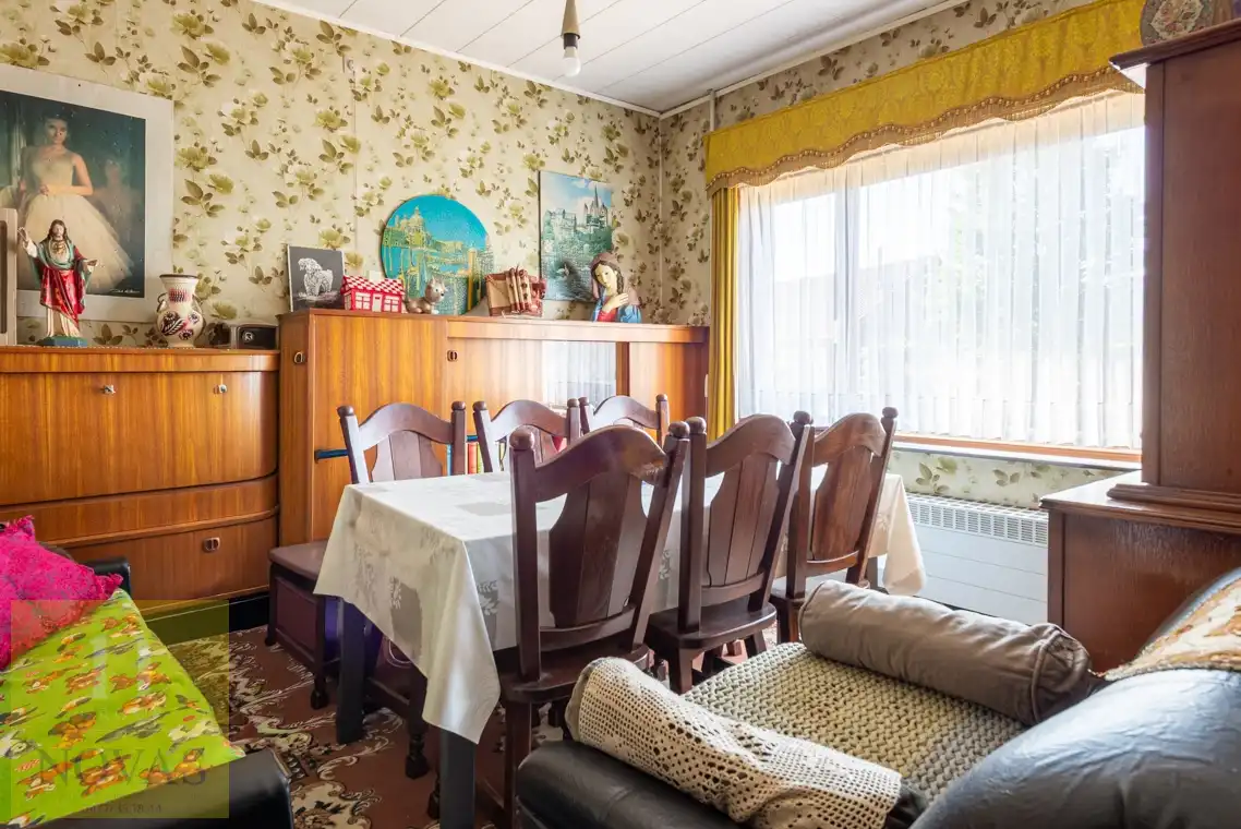 Landelijk gelegen woning op een perceel van 15 are, 23m straatbreedte foto 16