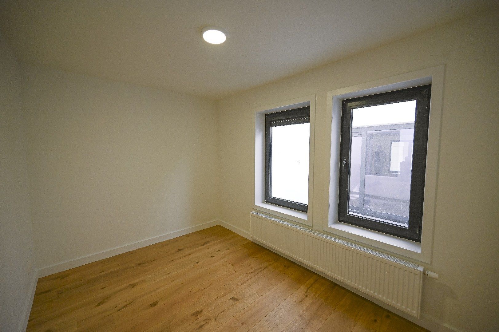 KNAP GELIJKVLOERS APPARTEMENT MET STADSTERRAS foto 6