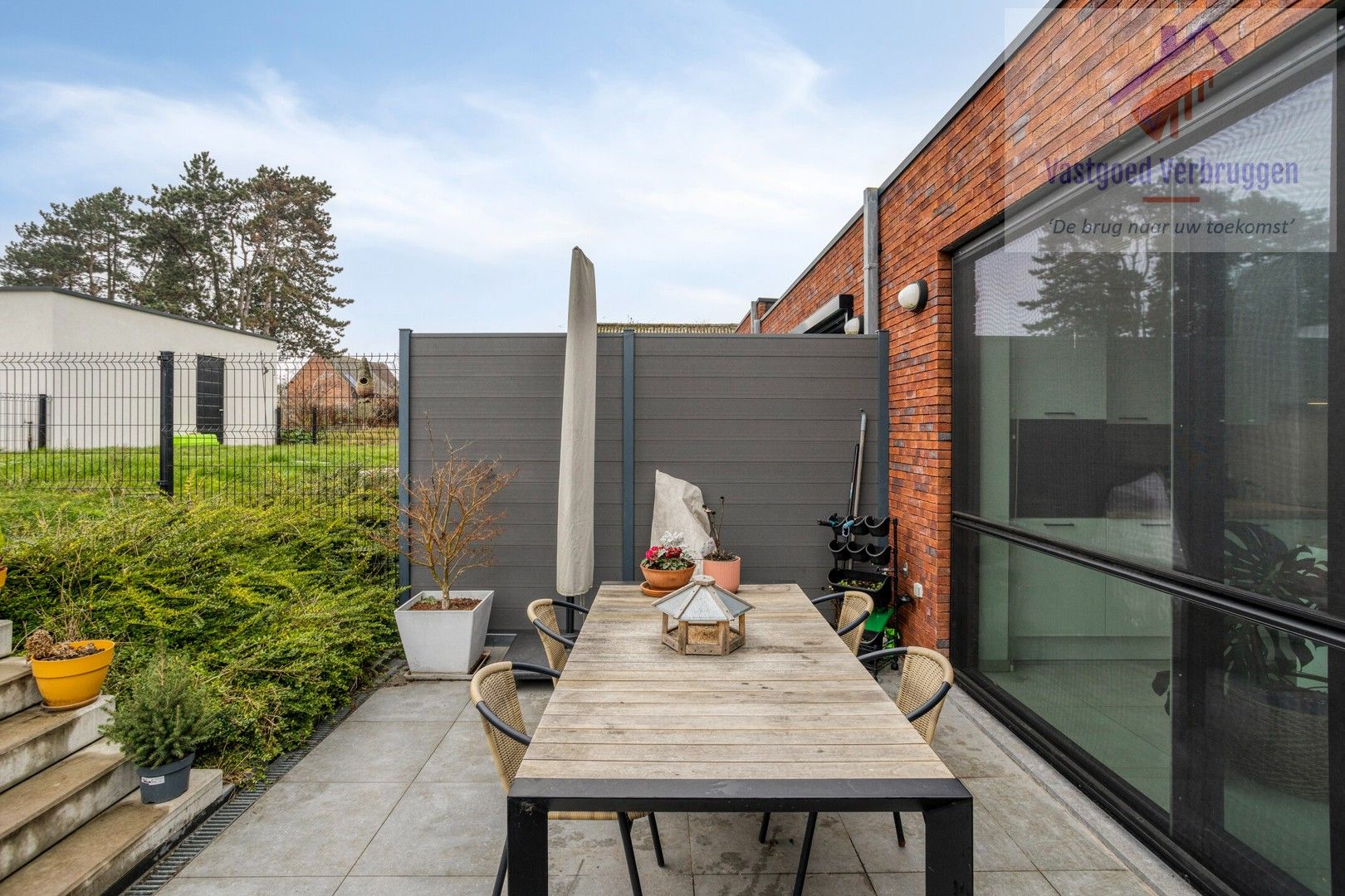 Recent gelijkvloers appartement met terras en tuin foto 15