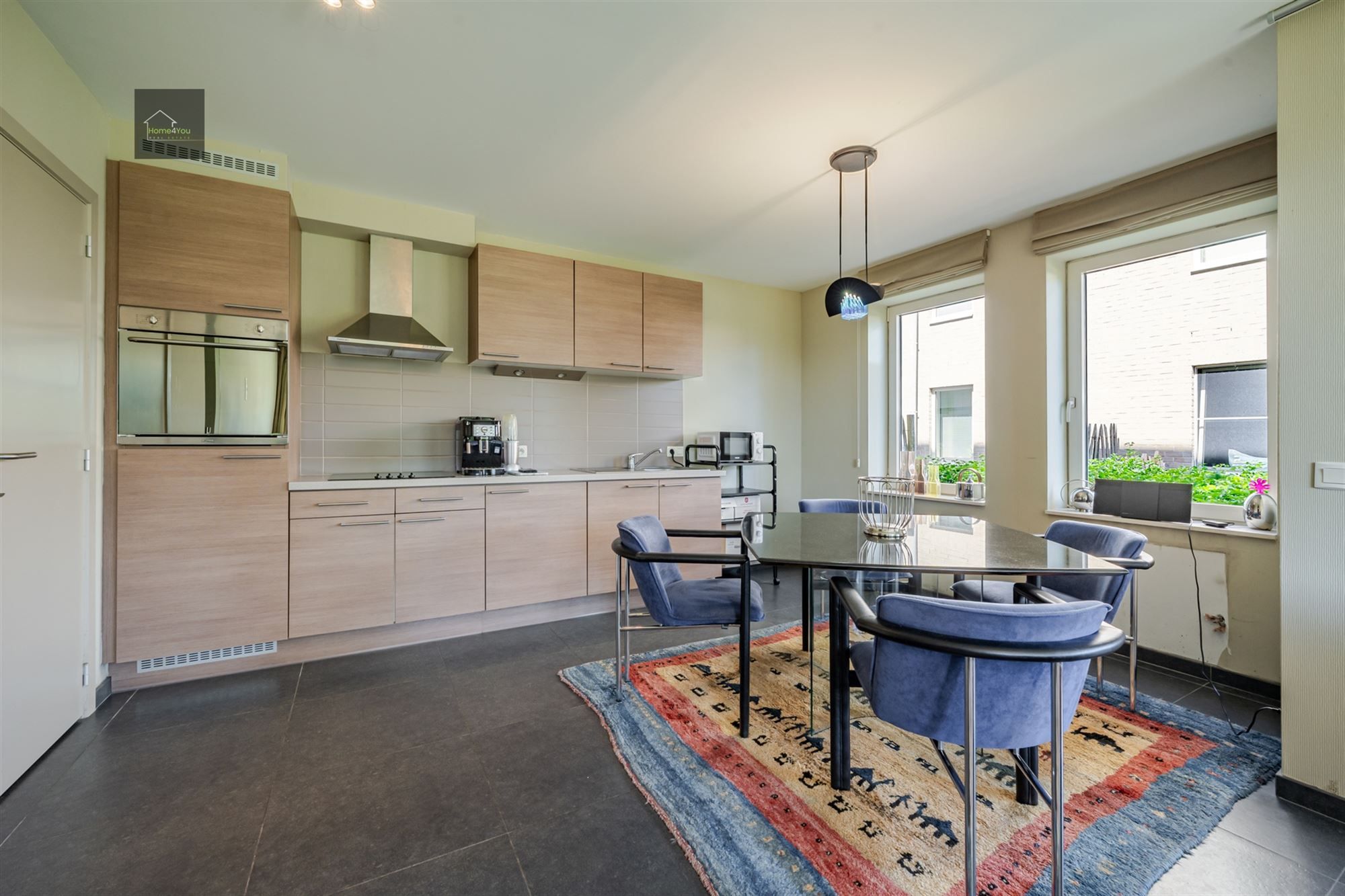 Instapklaar ruim gelijkvloersappartement met tuin! foto 5