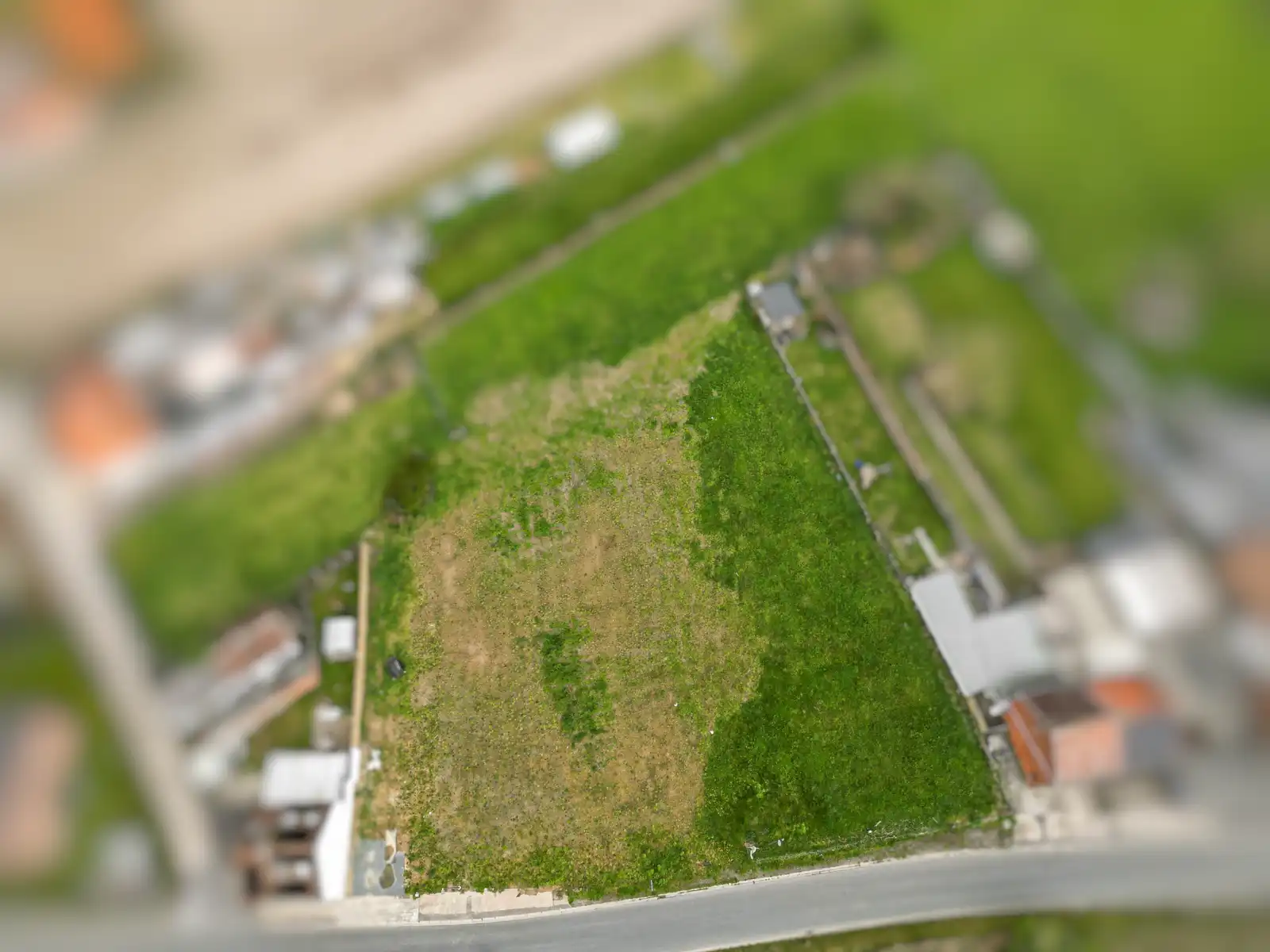 Bouwgrond (444m²) voor halfopen bebouwing te Malderen foto 2